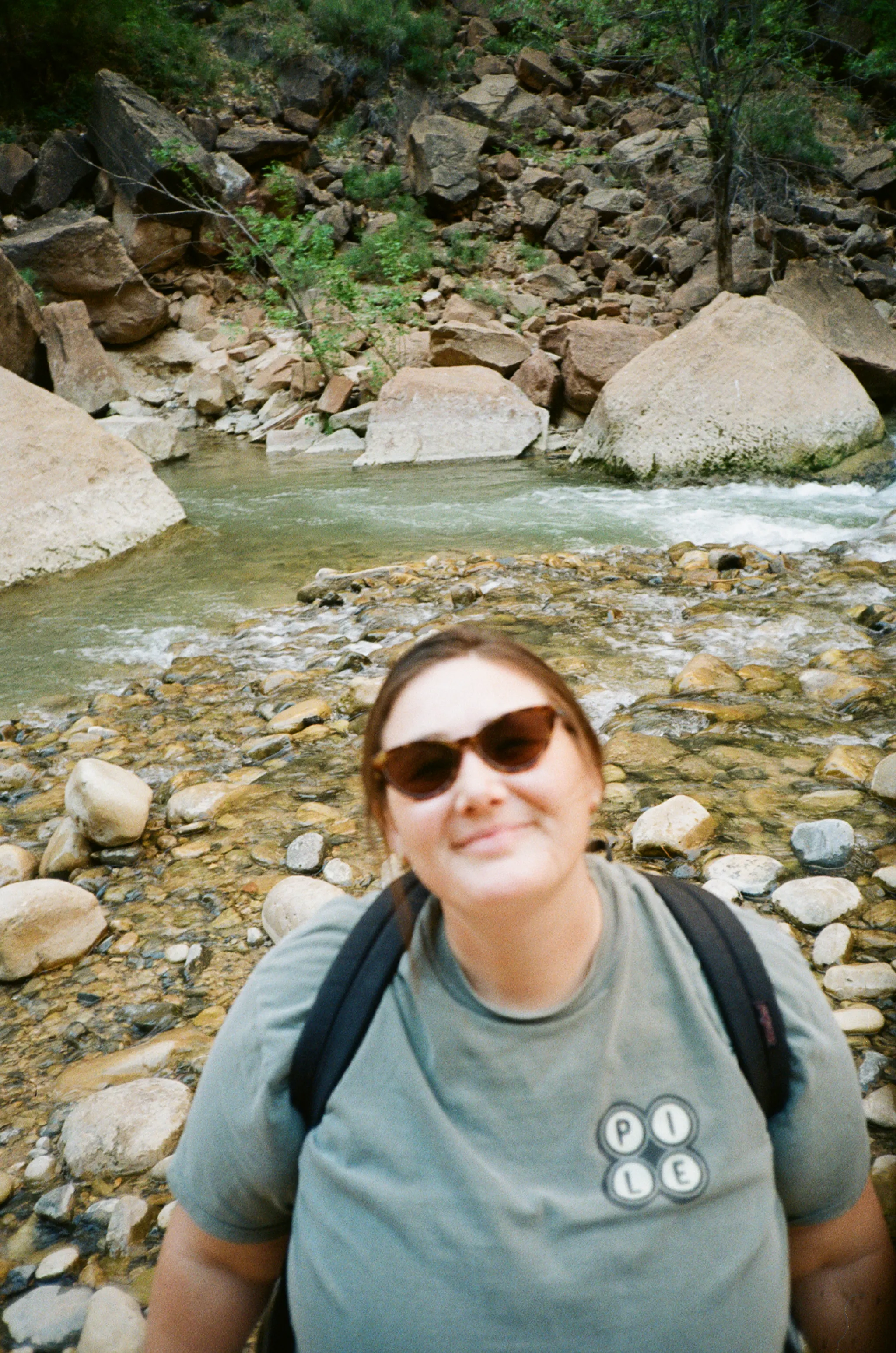 Photographer posing at the Narrows in Zion