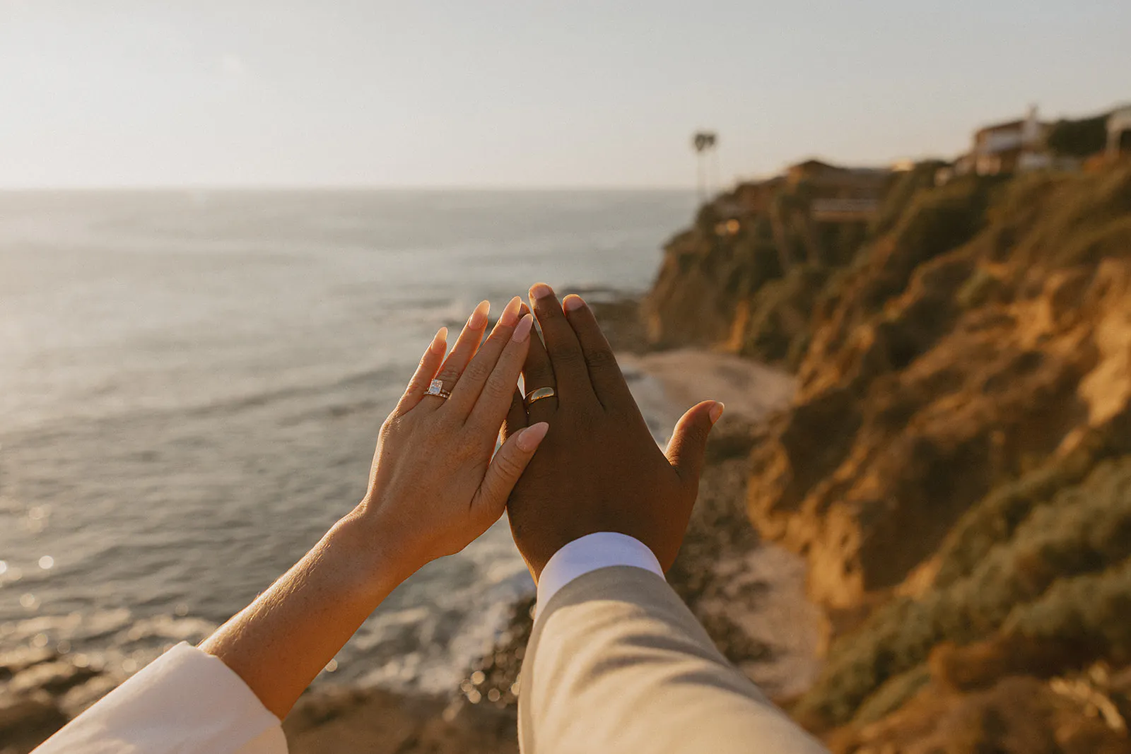 Fall cliffside Laguna Beach Elopement ring photos