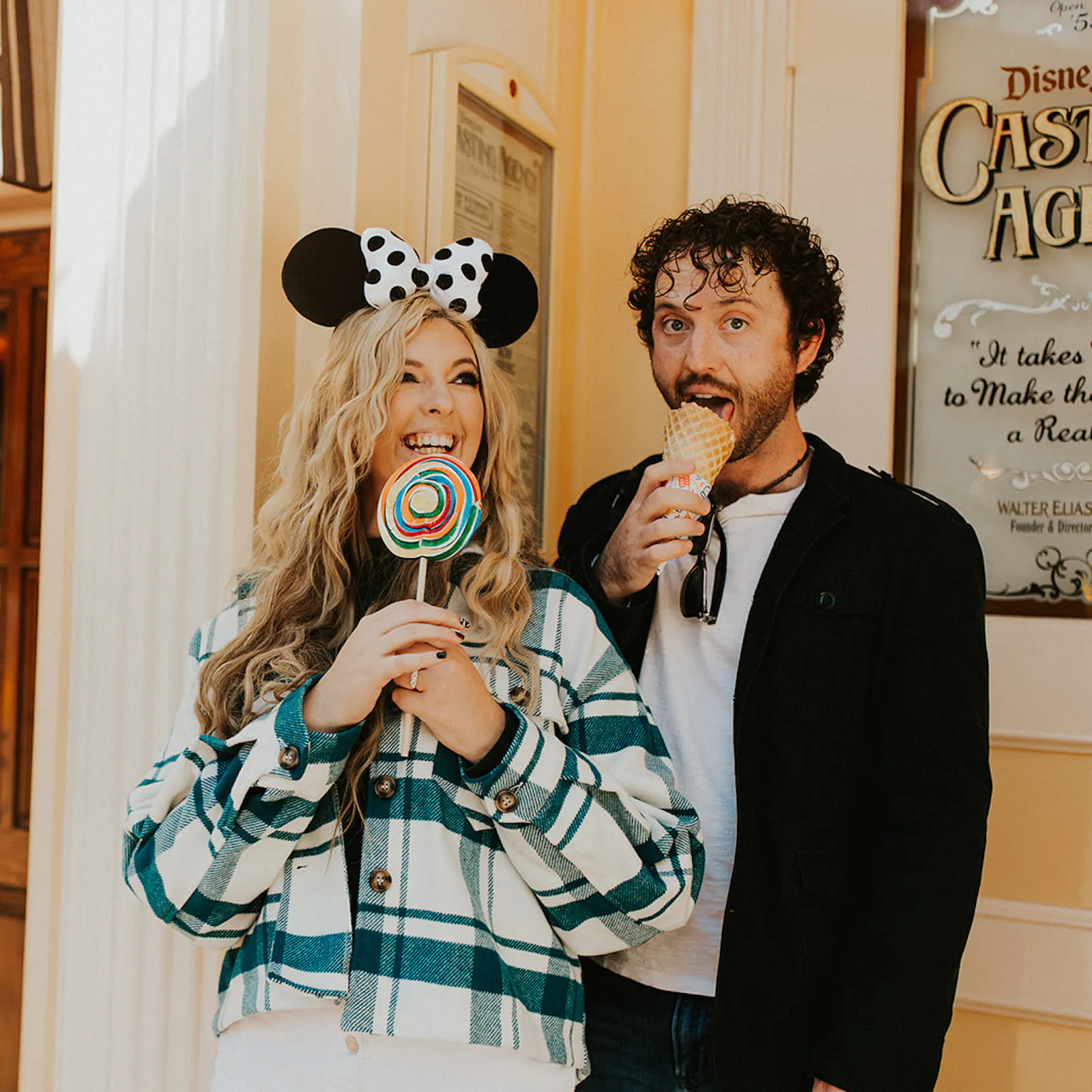 Couple shares treat on Main Street USA at Disneyland