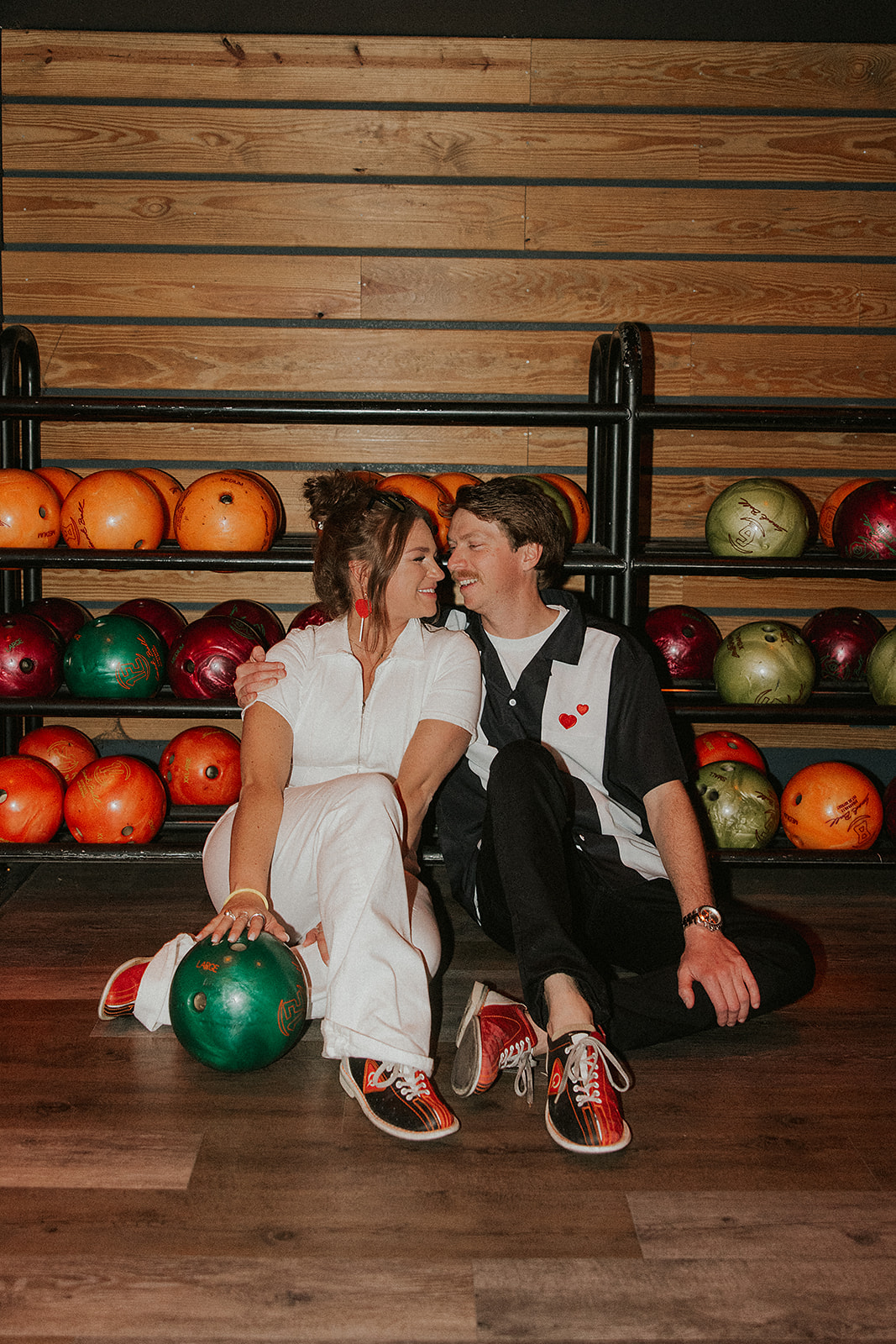 Couple at their Bowling Alley Rehearsal Dinner 