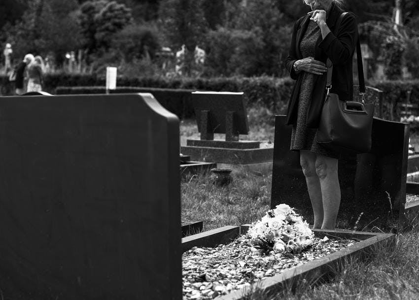 graveyard-woman-sad