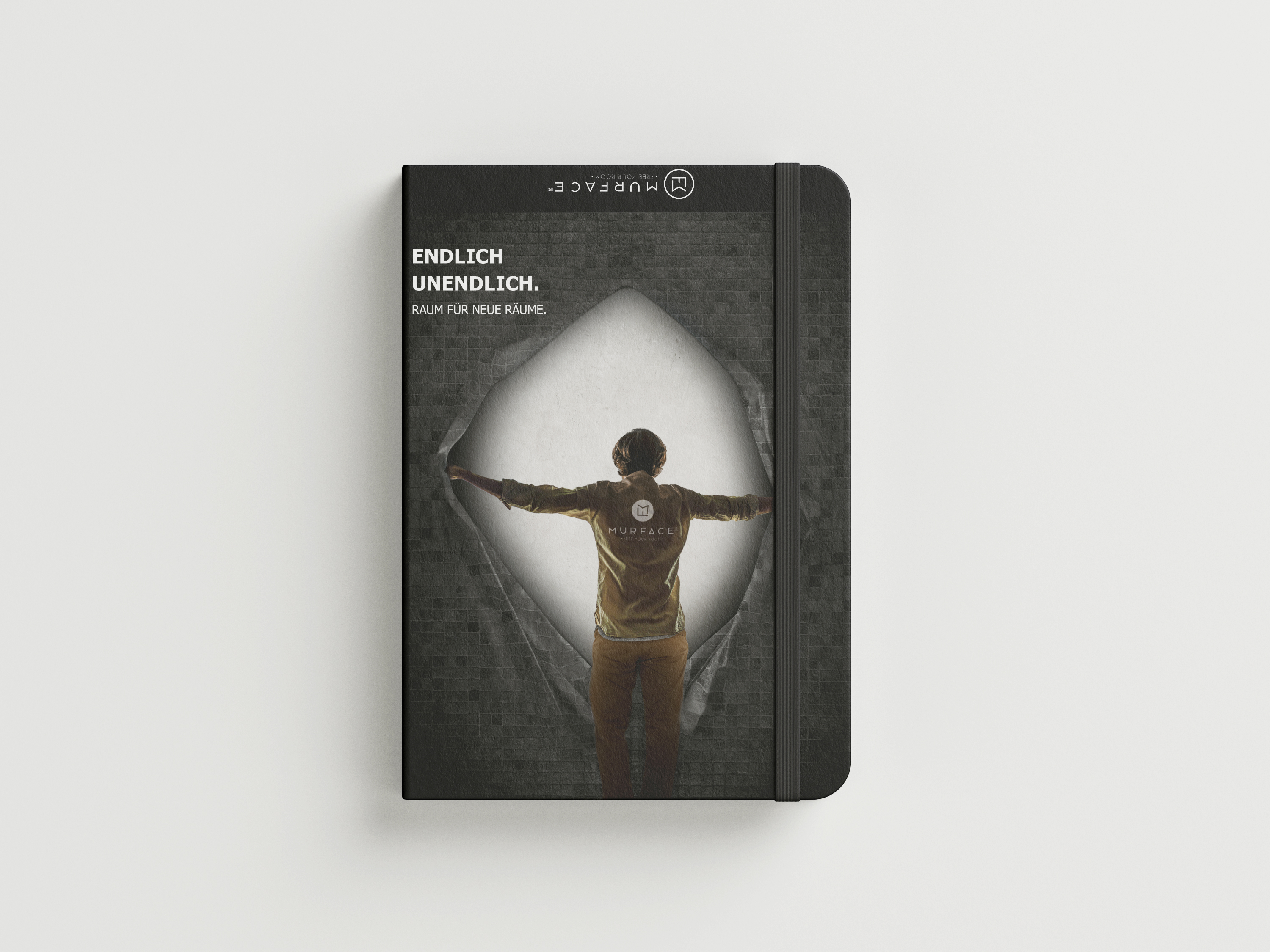 Notizbuch mit dem Murface Design und dem Claim "Endlich Unendlich"- Digitalisierung Handwerk von der Meisterstück Agency aus Köln.