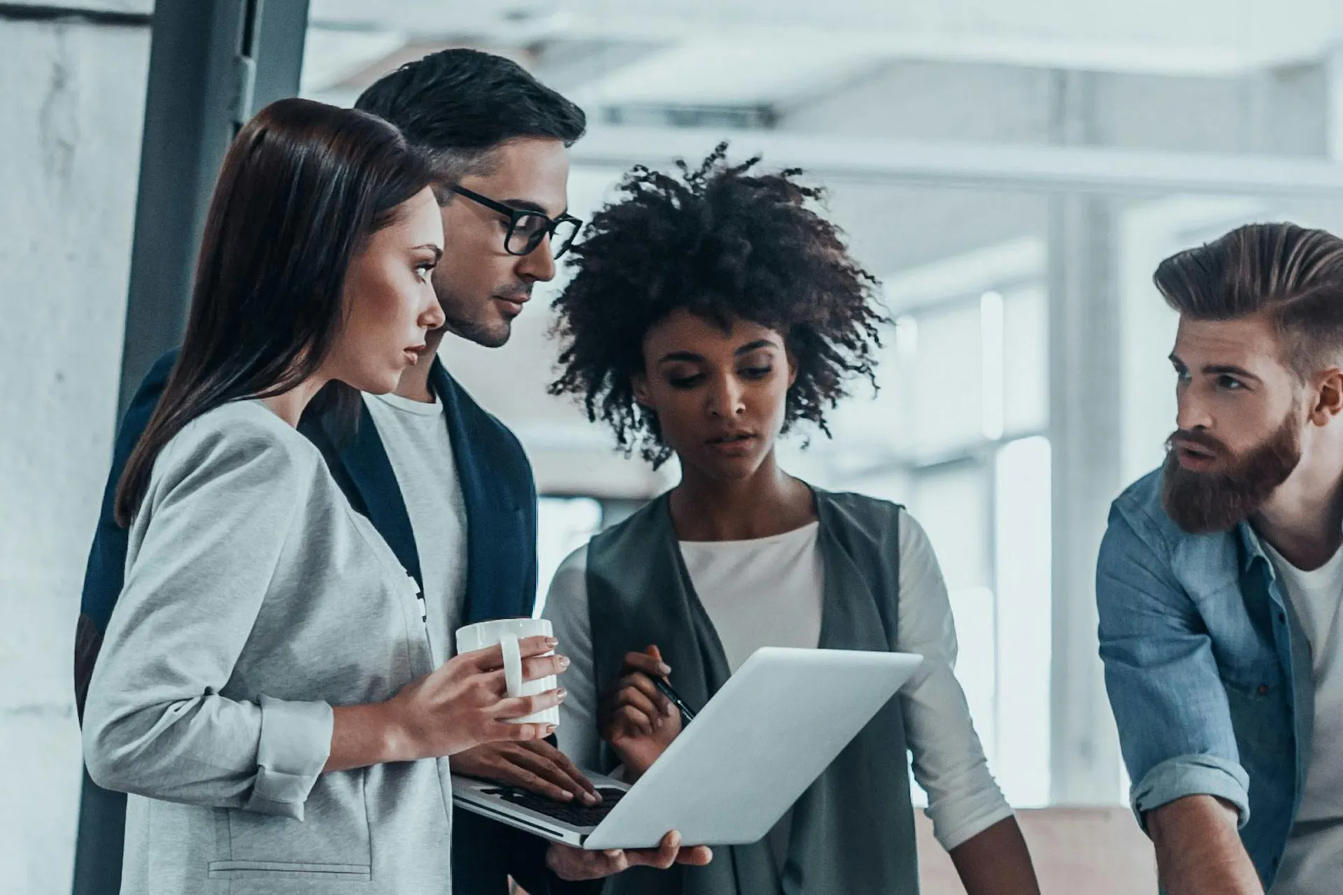 Photo of a team in an office working together