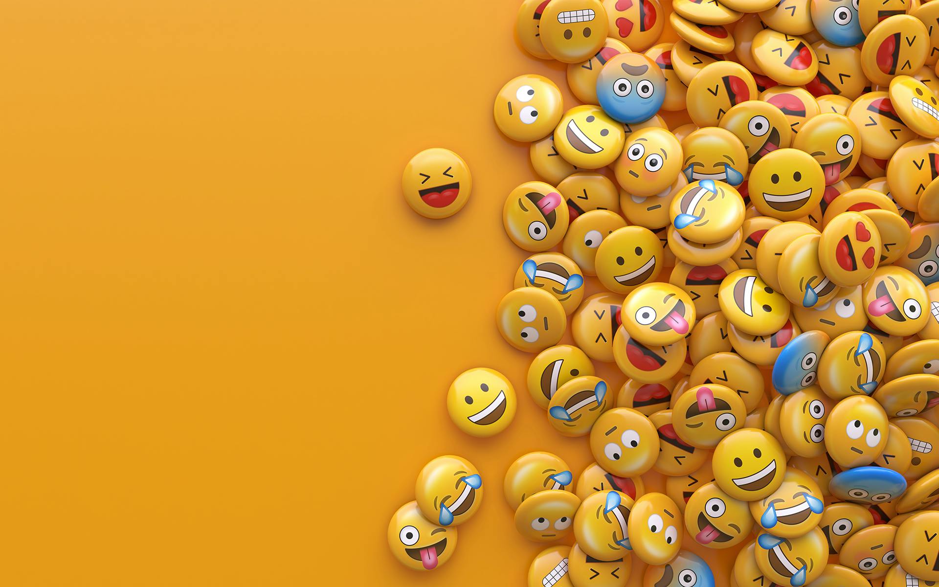 A pile of emojis on a plain yellow background. 