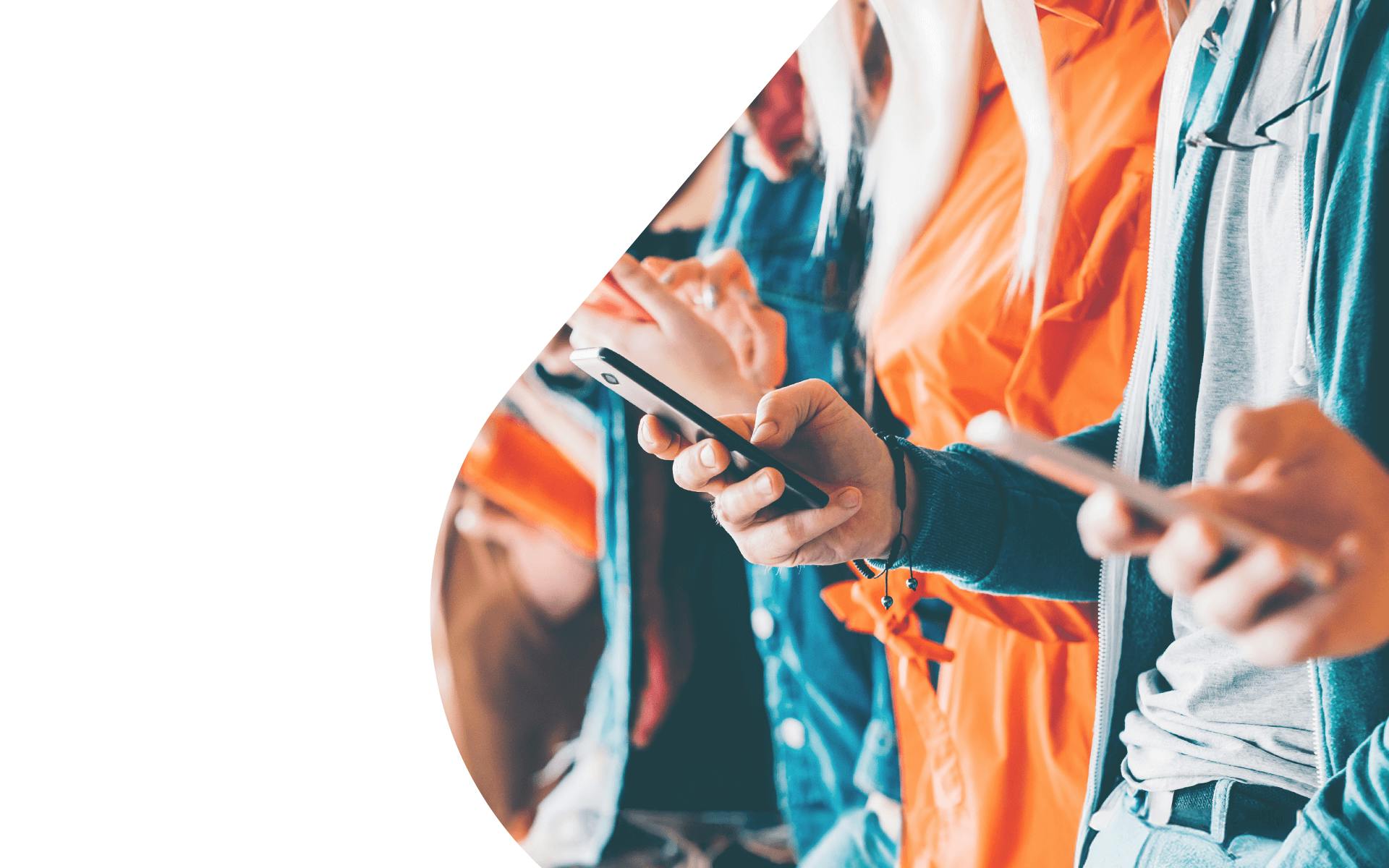 image of a row of people standing and holding smartphones in their hands