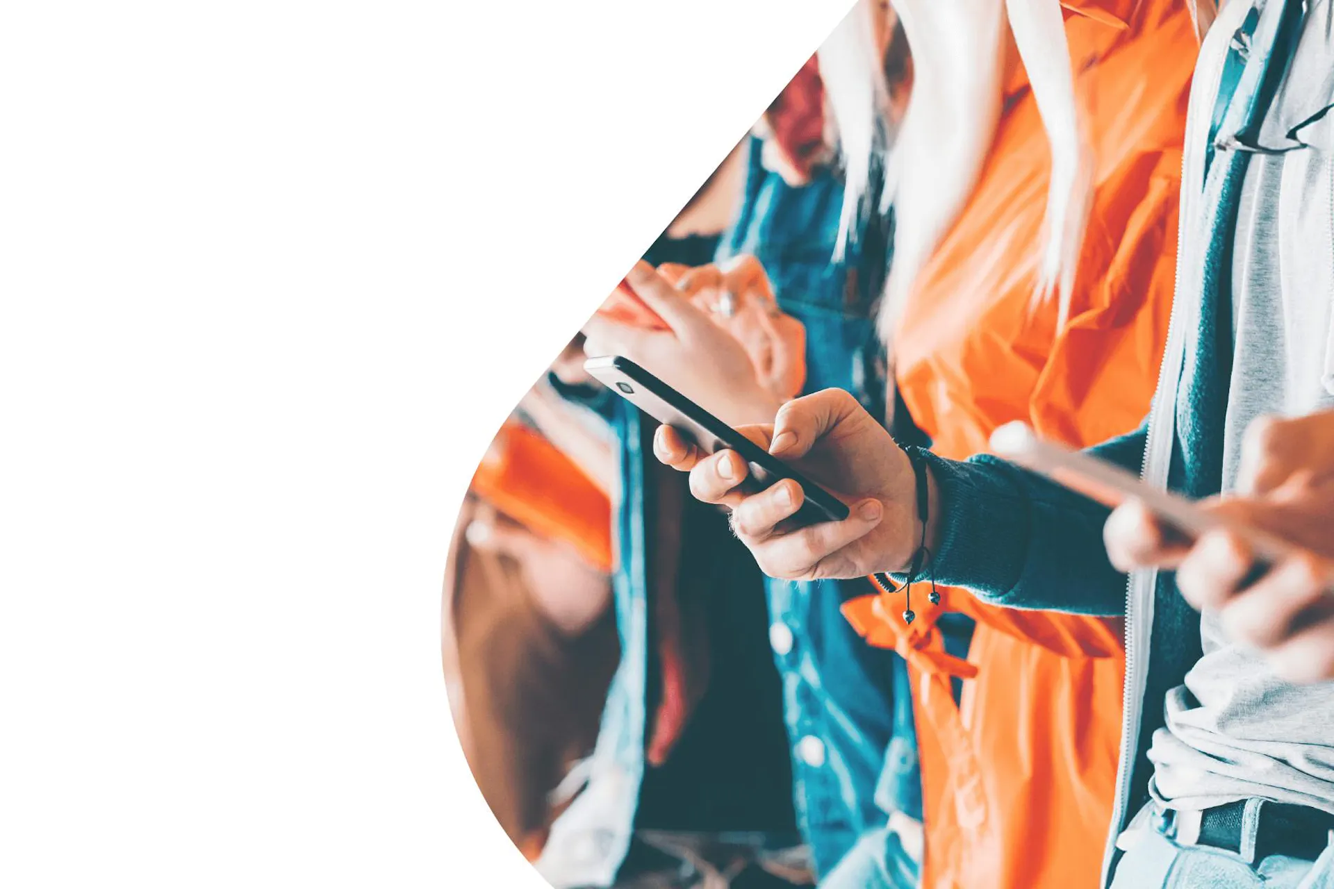 image of a row of people standing and holding smartphones in their hands