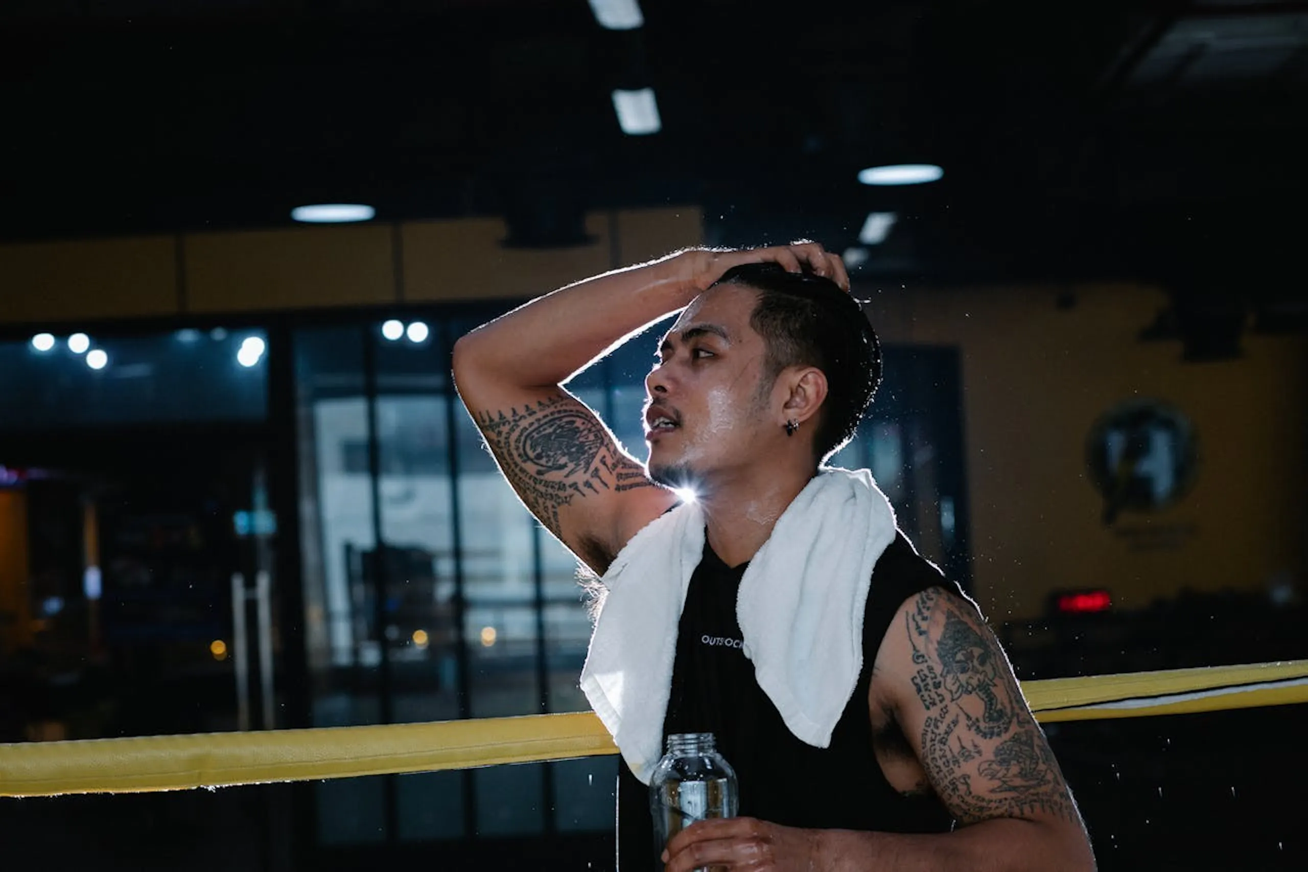 An athlete taking a drink.