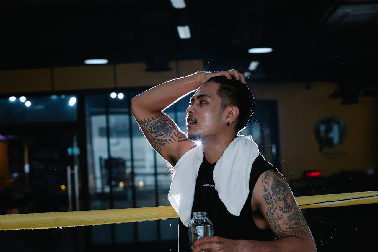An athlete taking a drink.