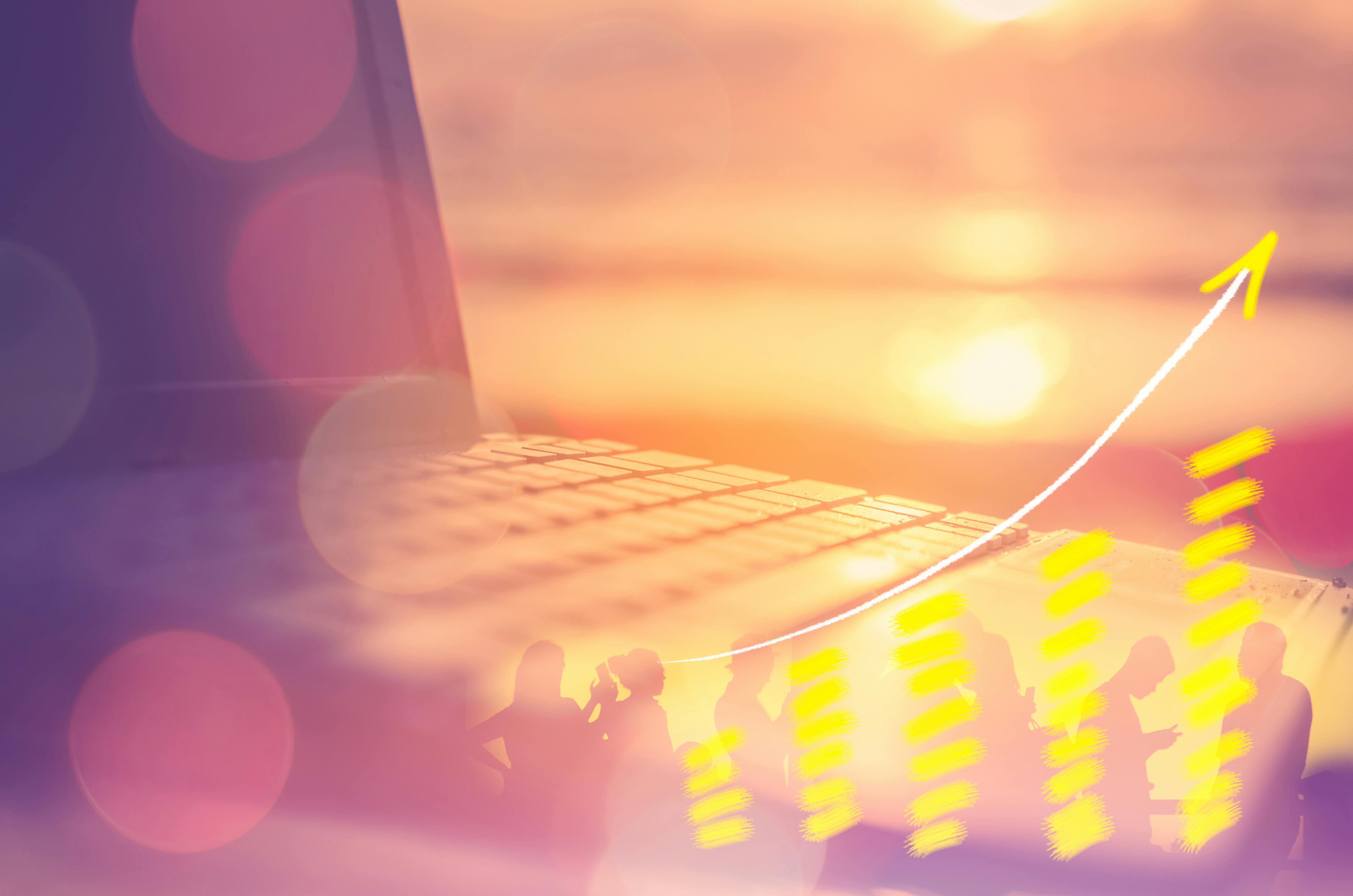 Image of a laptop with an arrow pointing upwards