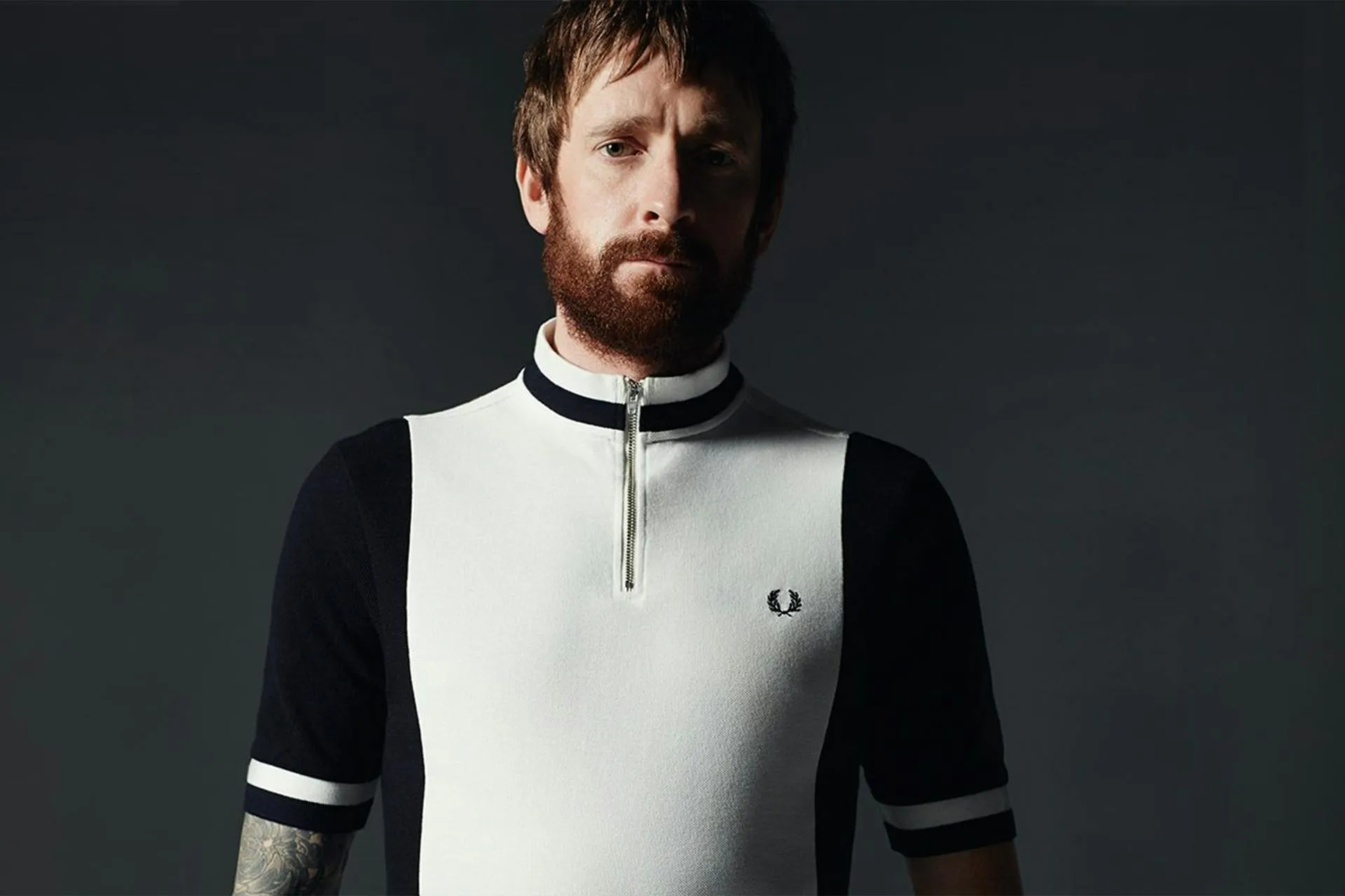 A man wearing a Fred Perry top