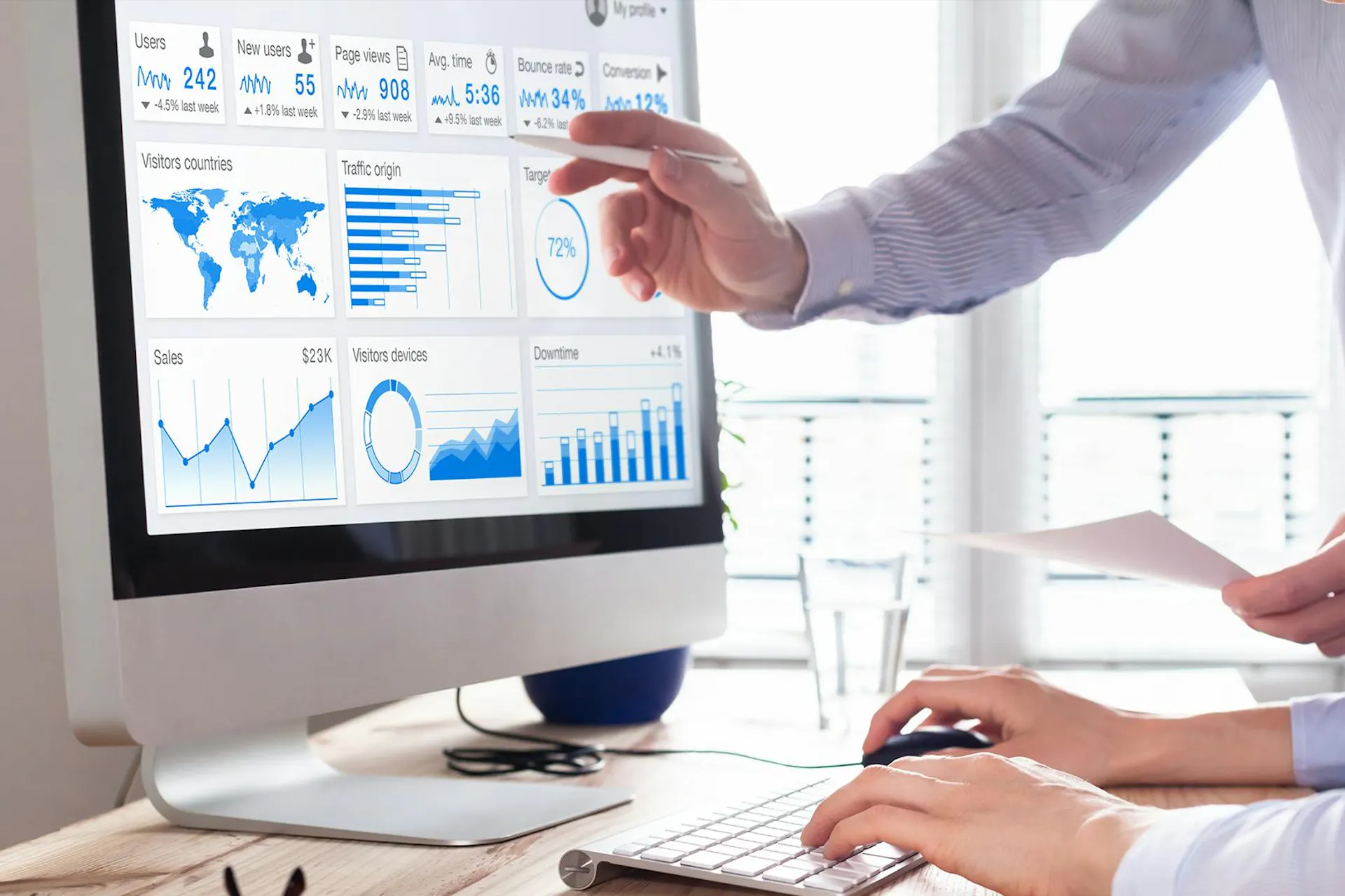 Webinar: People look at a dashboard on a monitor