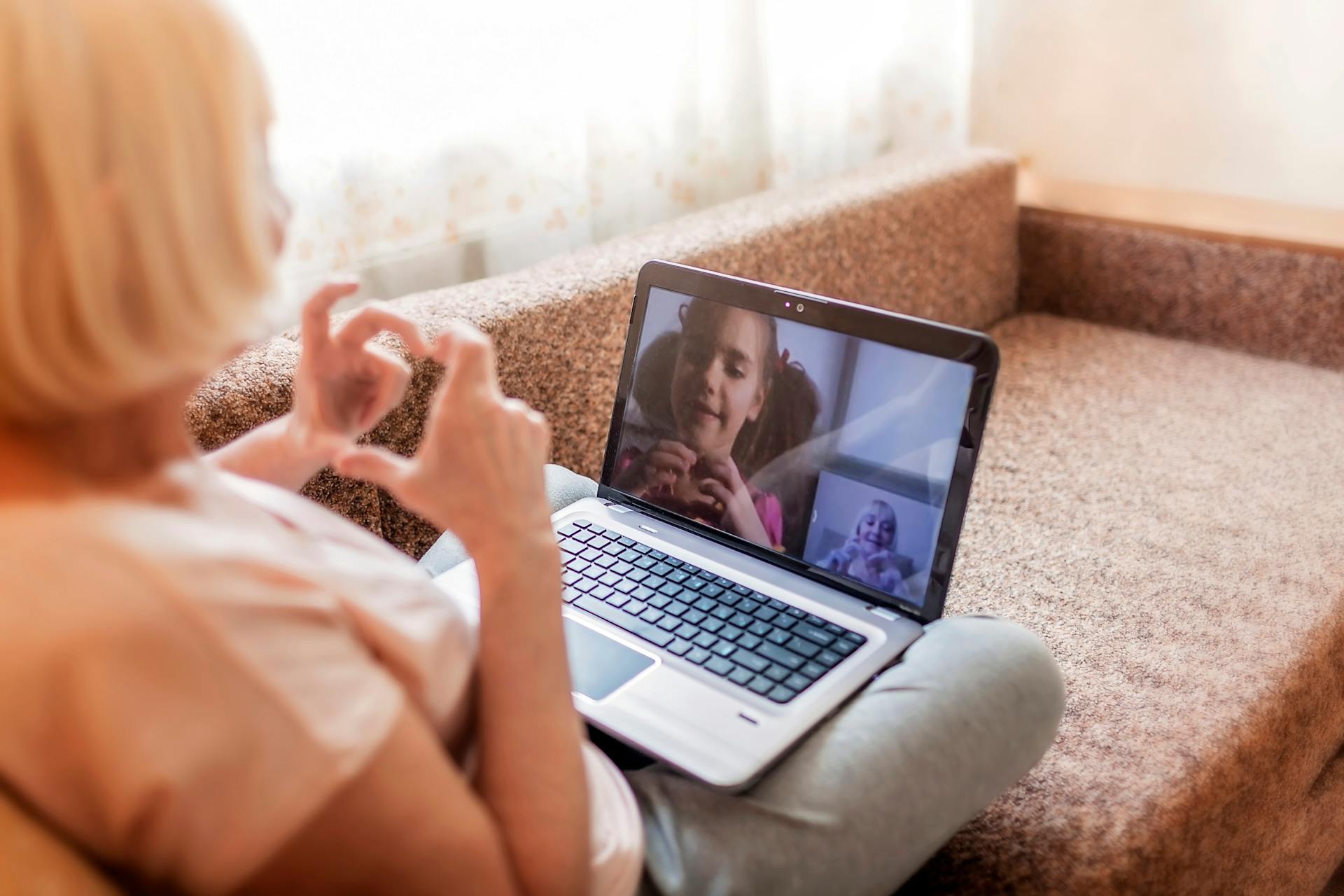 Family videocalling one another