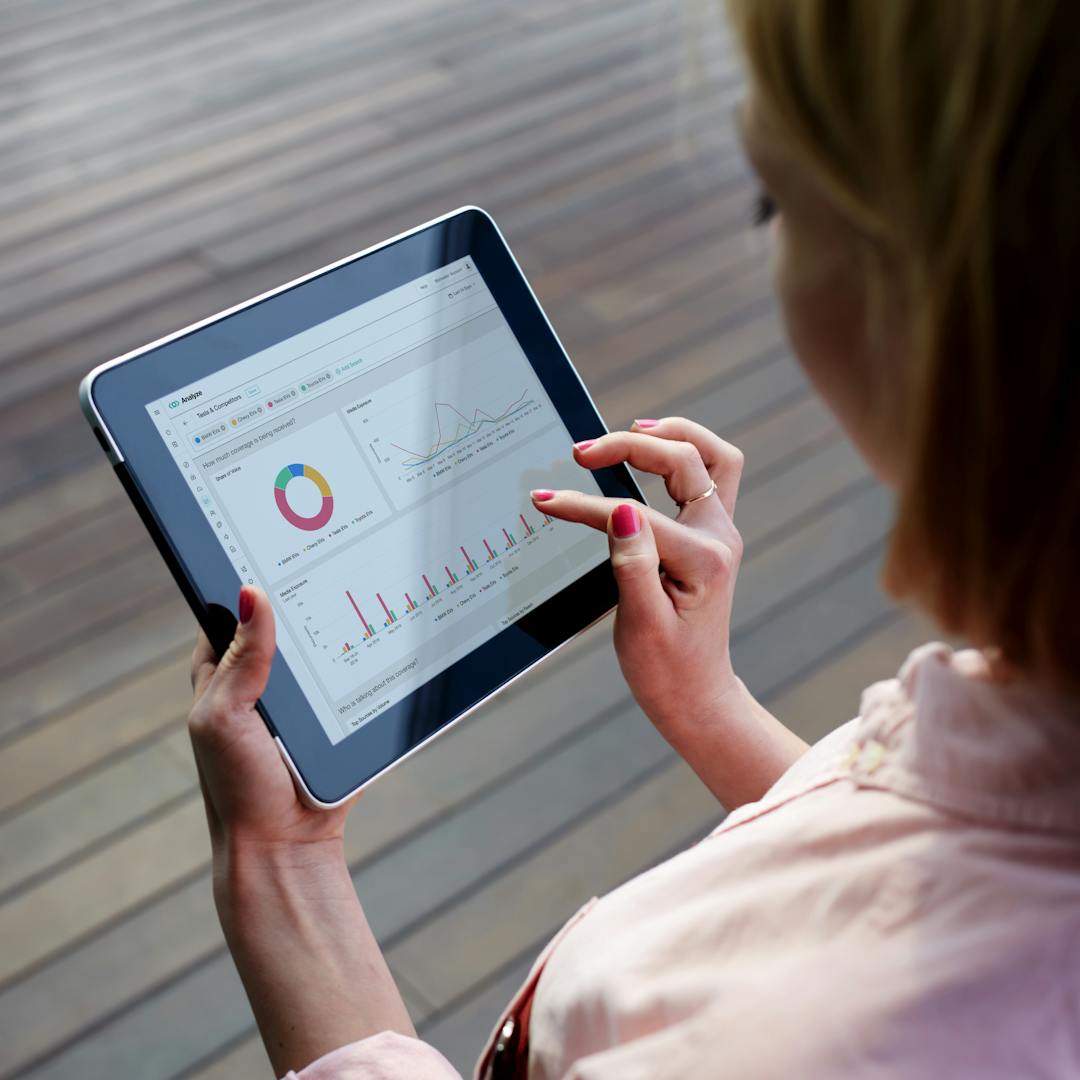 a woman checking tablet