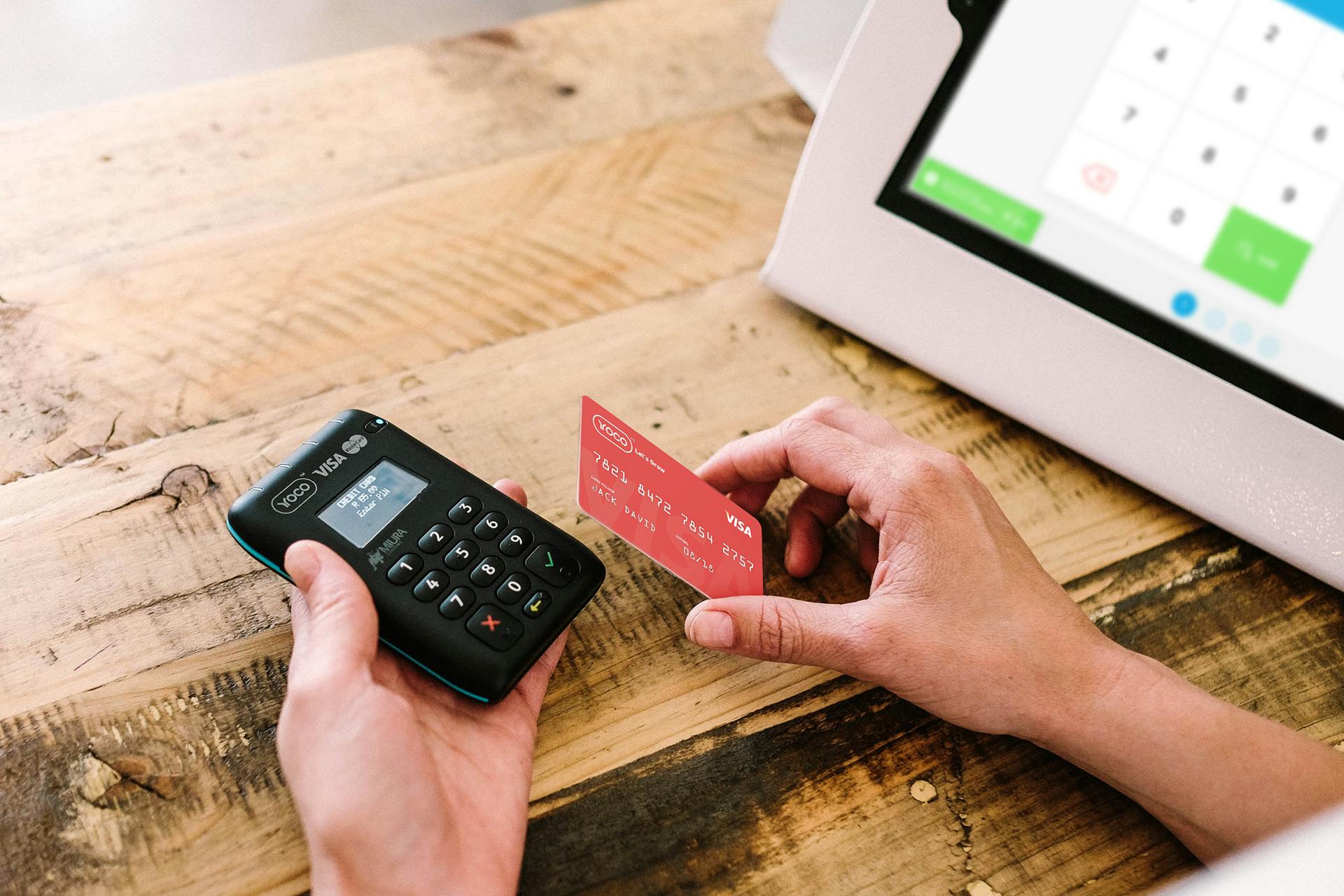Photo of someone paying by card