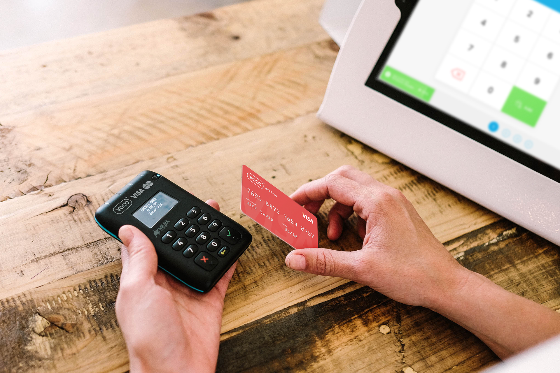 Photo of someone paying by card