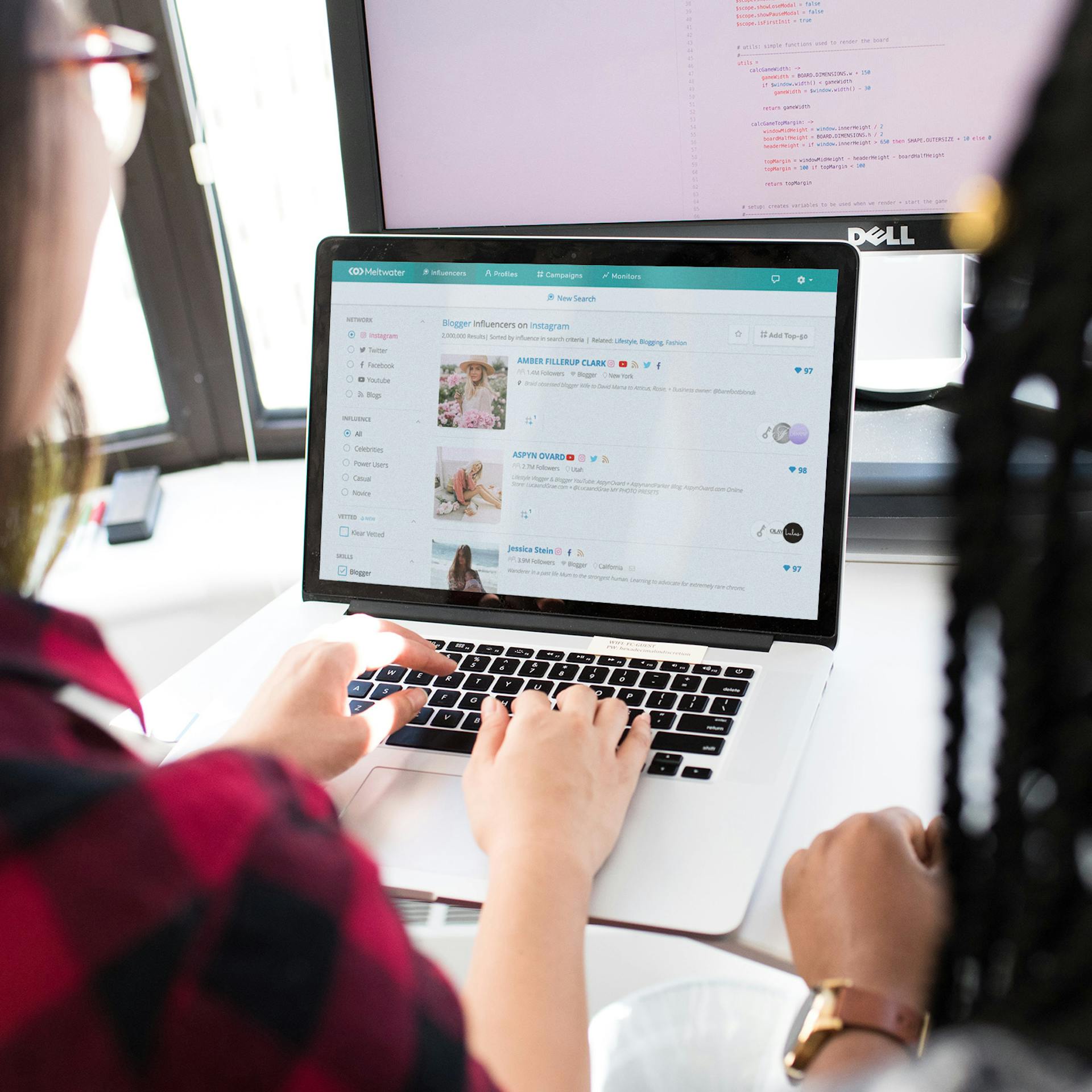 Meltwater Social Influencers platform on Laptop for finding influencers