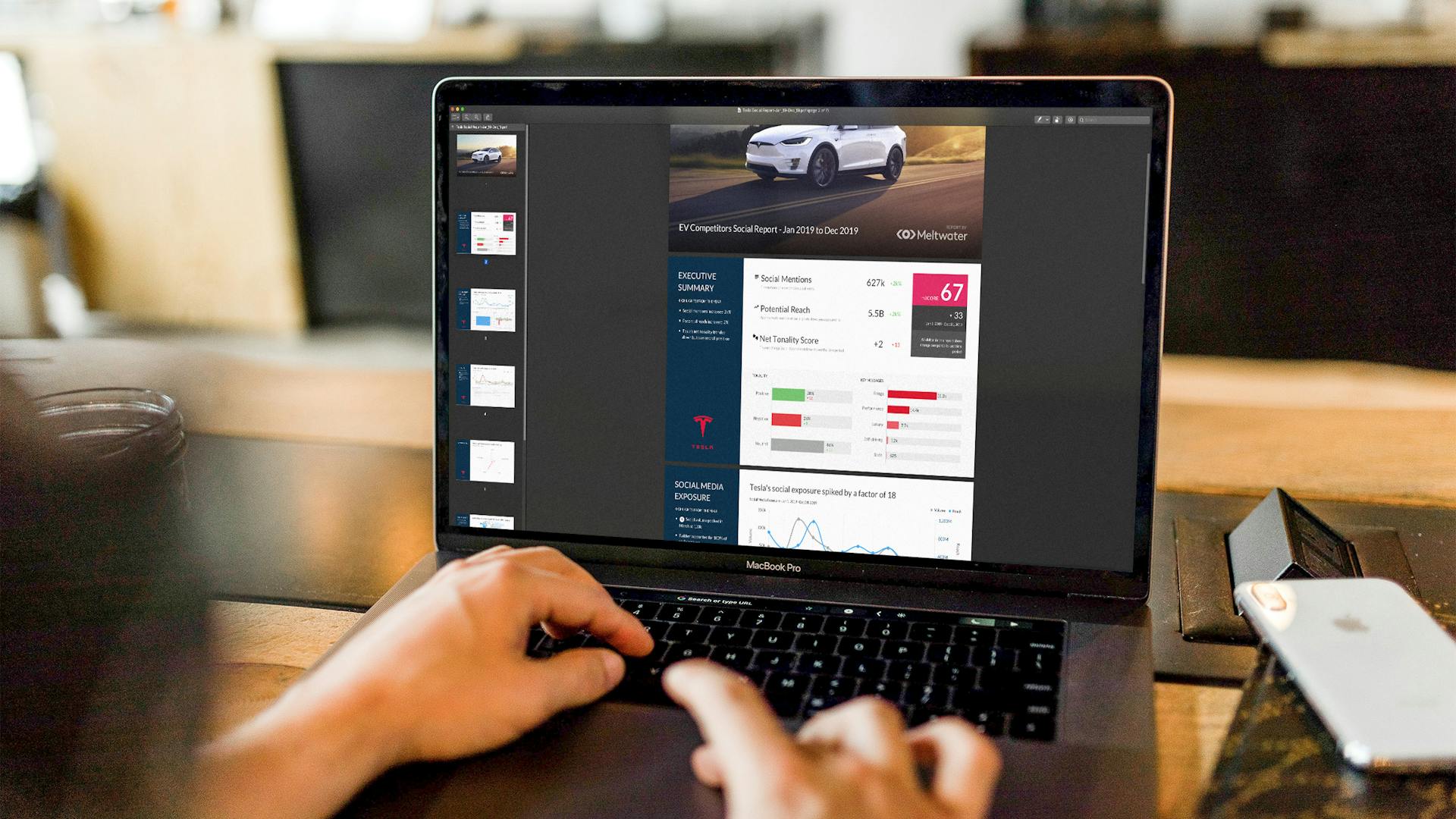 person working on report on his laptop