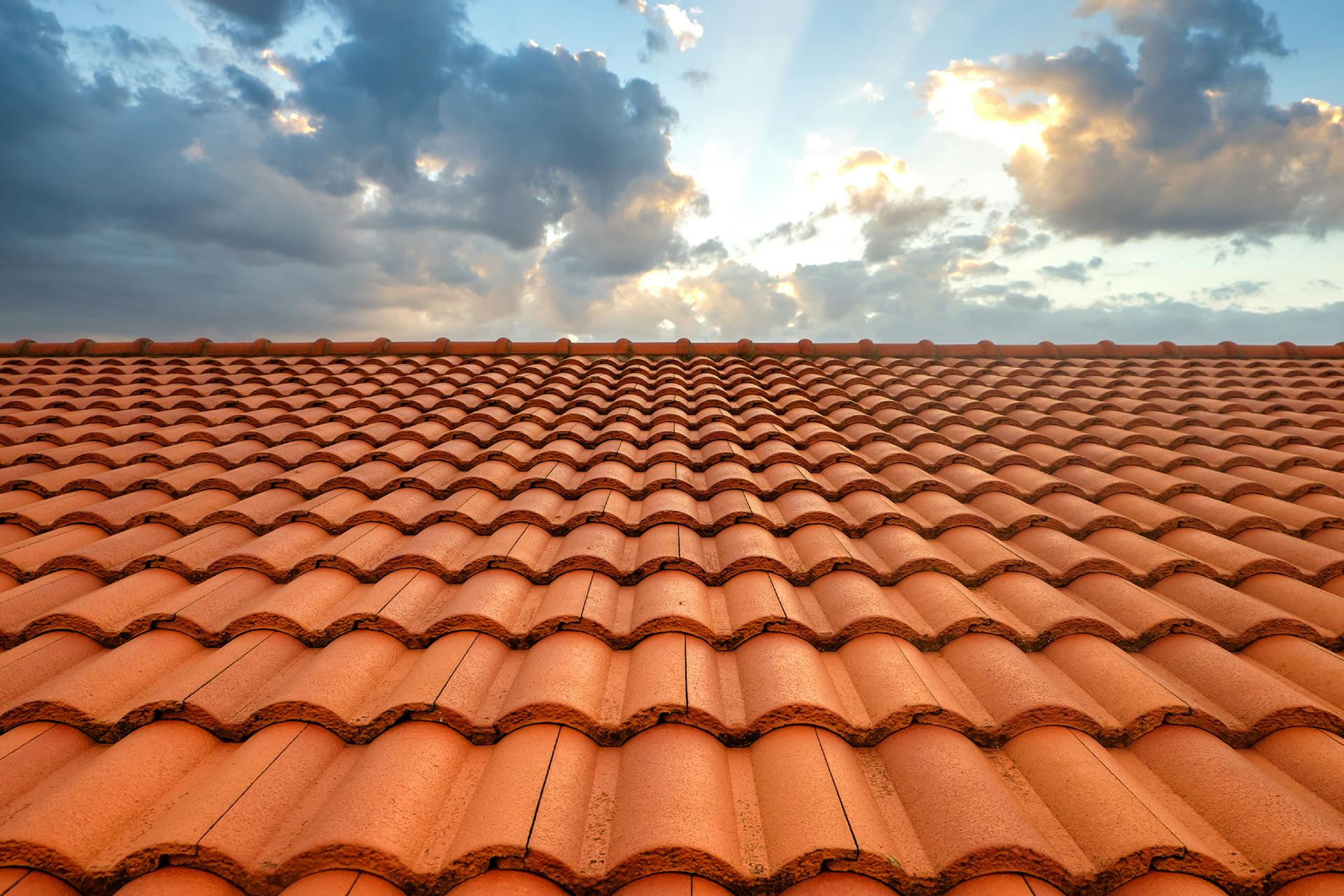 Photo of a house roof towards the sky