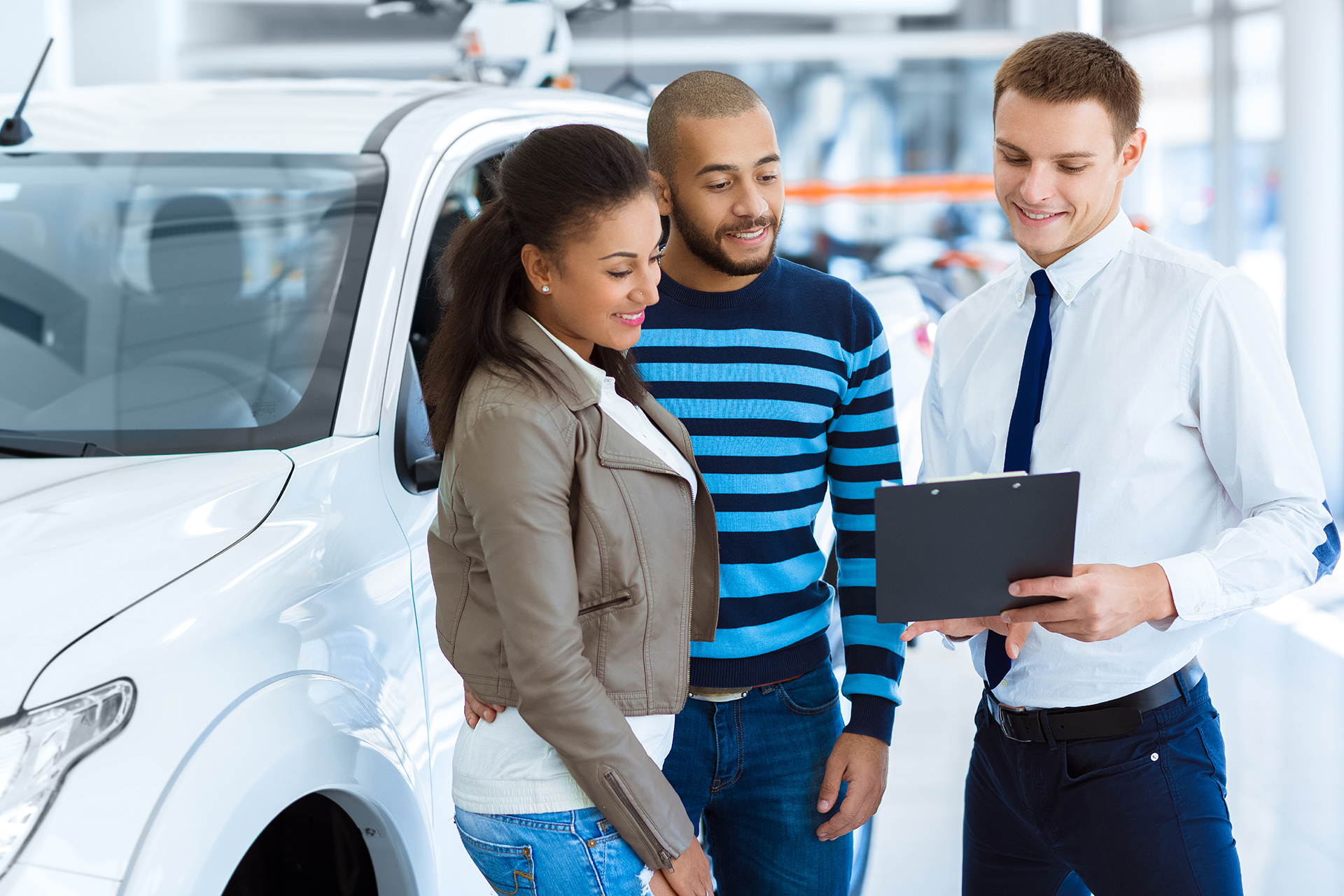 Photo of a couple about to buy a car