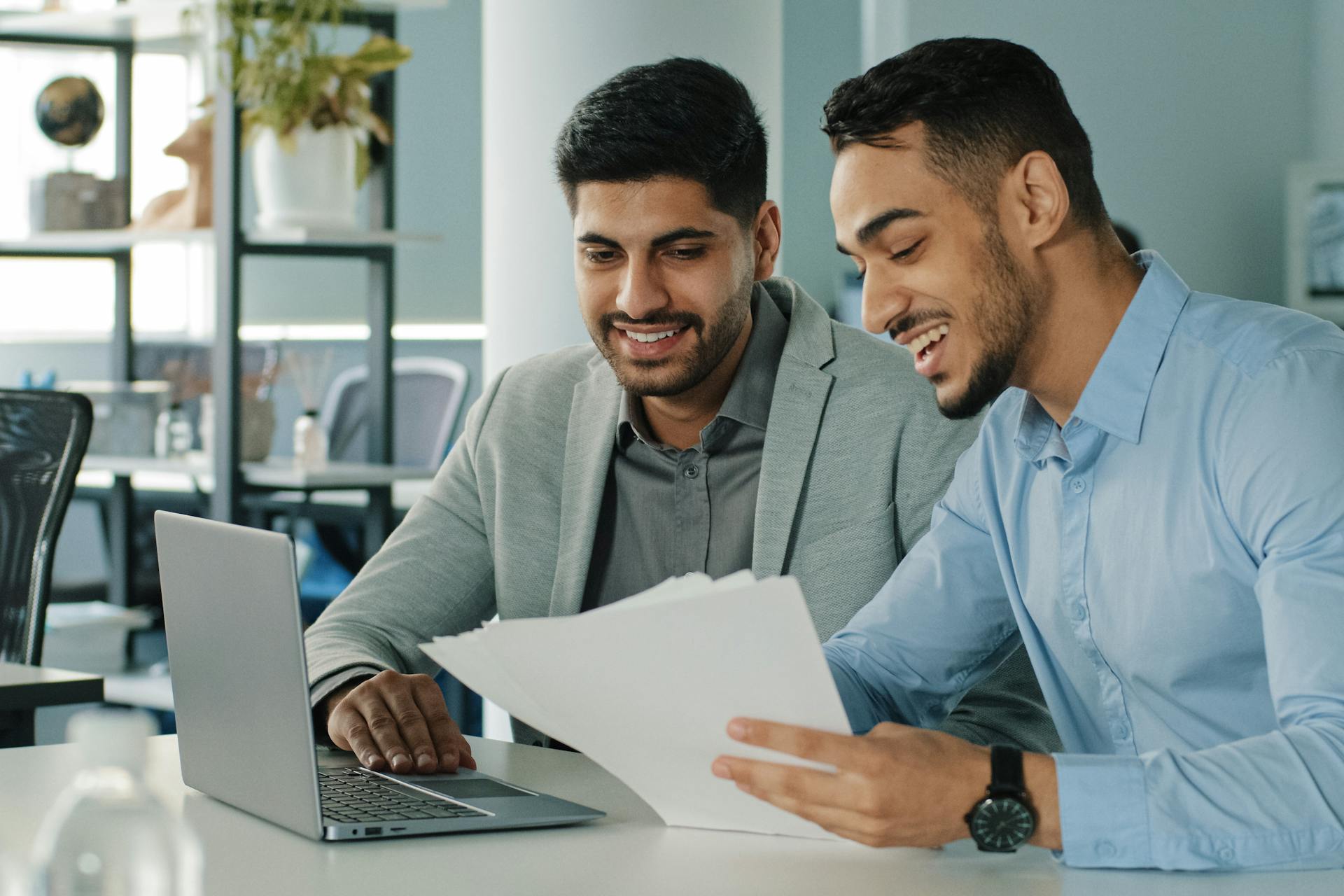 Consultants analysing reports