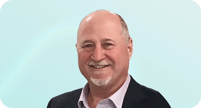 Headshot of Doug Balut, SVP Global Alliances & Partnerships at Meltwater