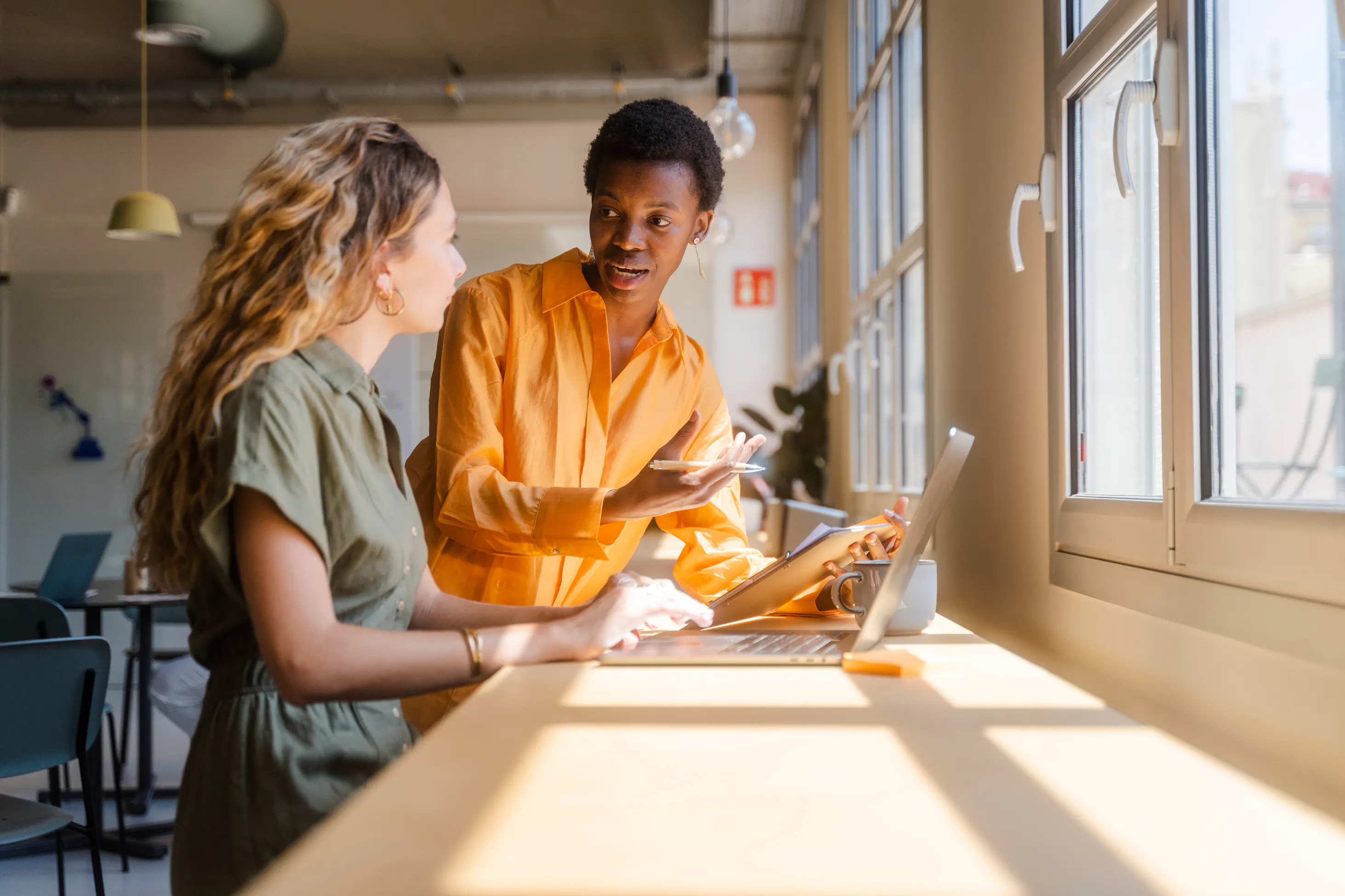 image of two team members brainstorming