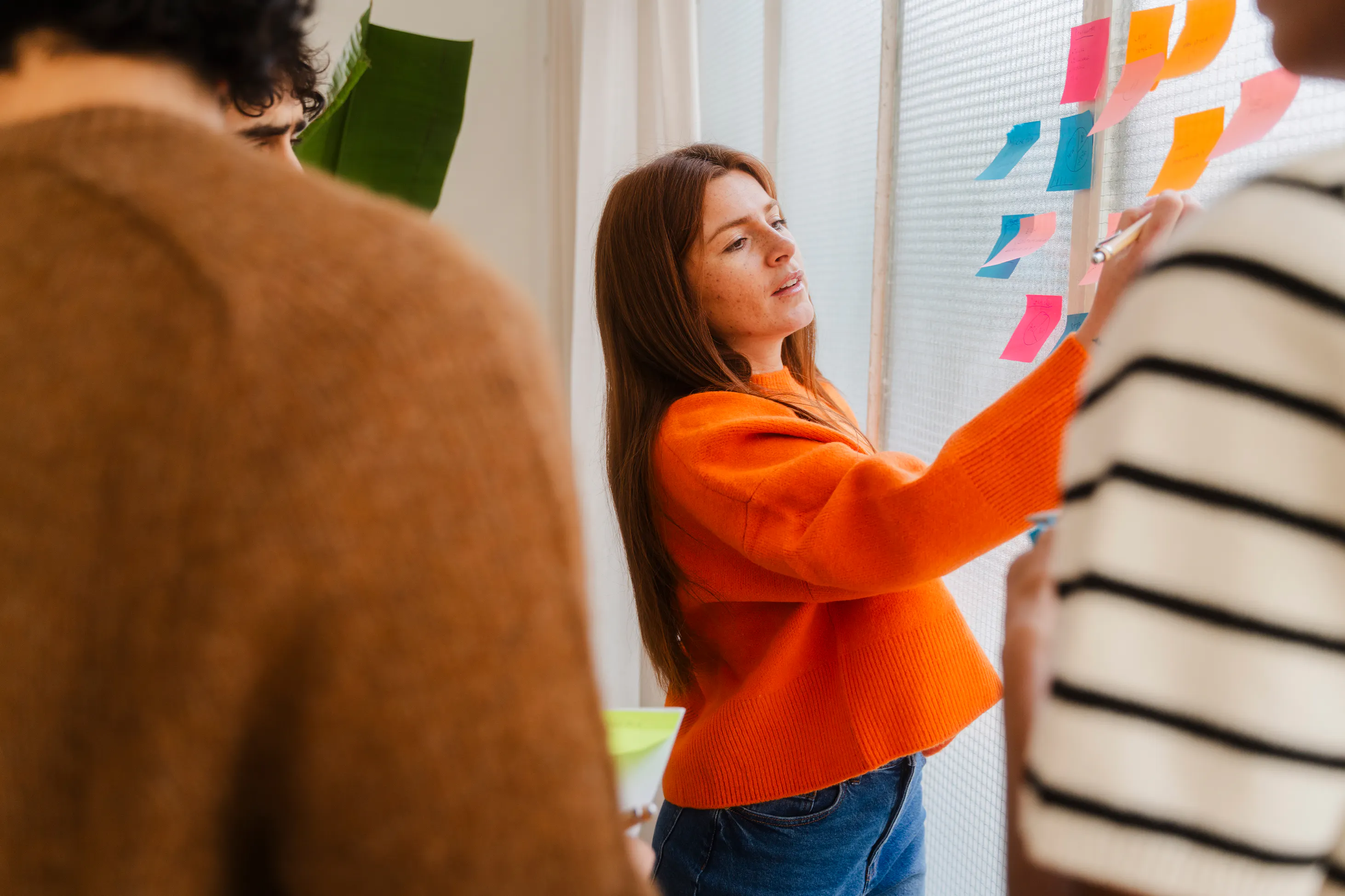 woman standing at board