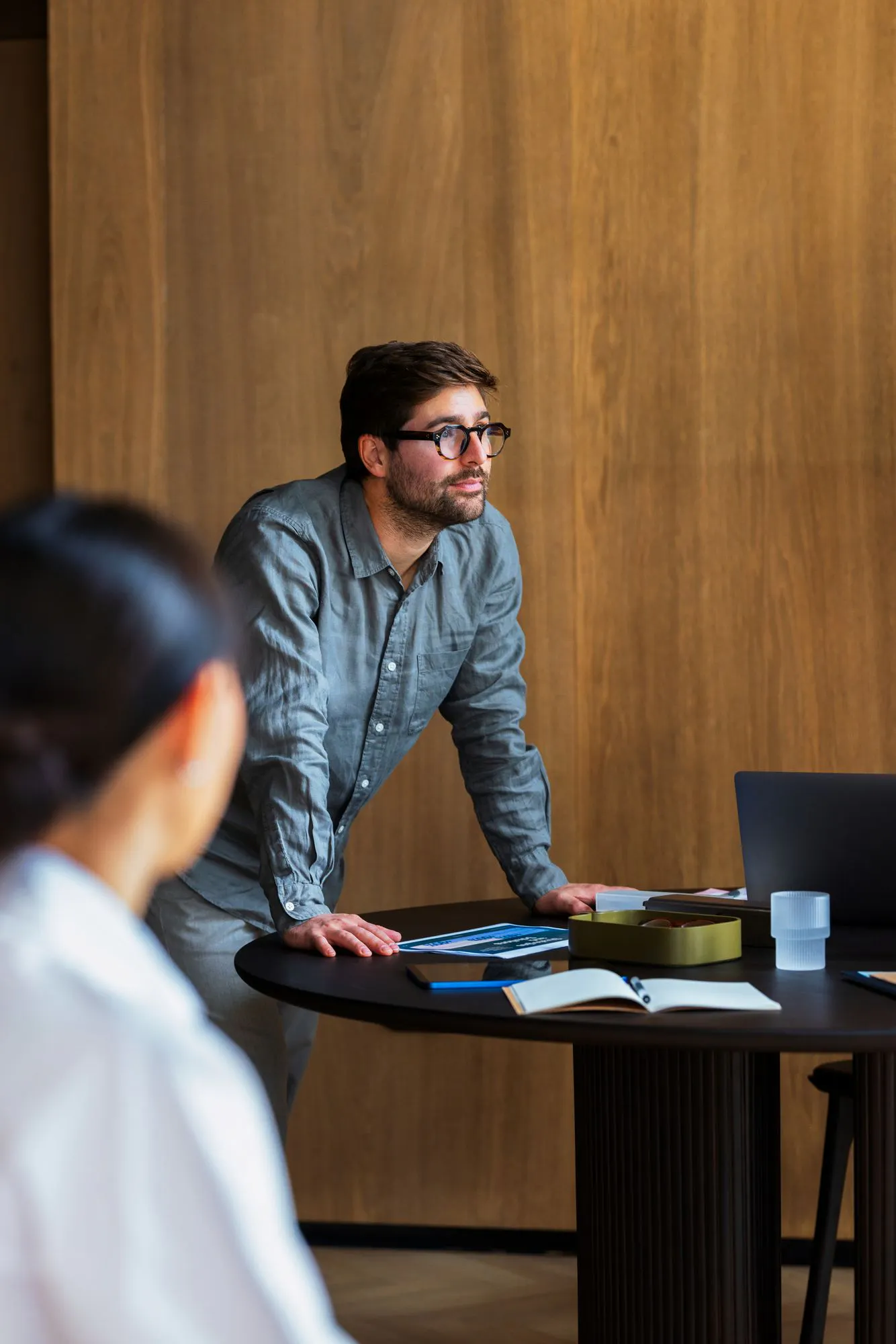 man standing at a table