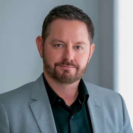 Headshot of Chris Hackney, Chief Product Officer at Meltwater