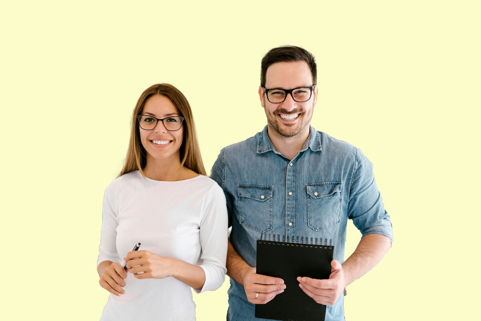 Two people standing in front of a light yellow background