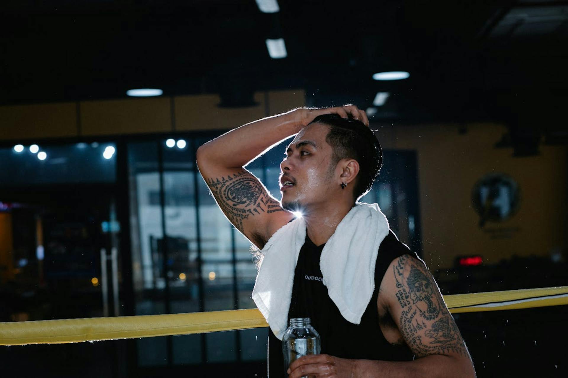 An athlete taking a drink.