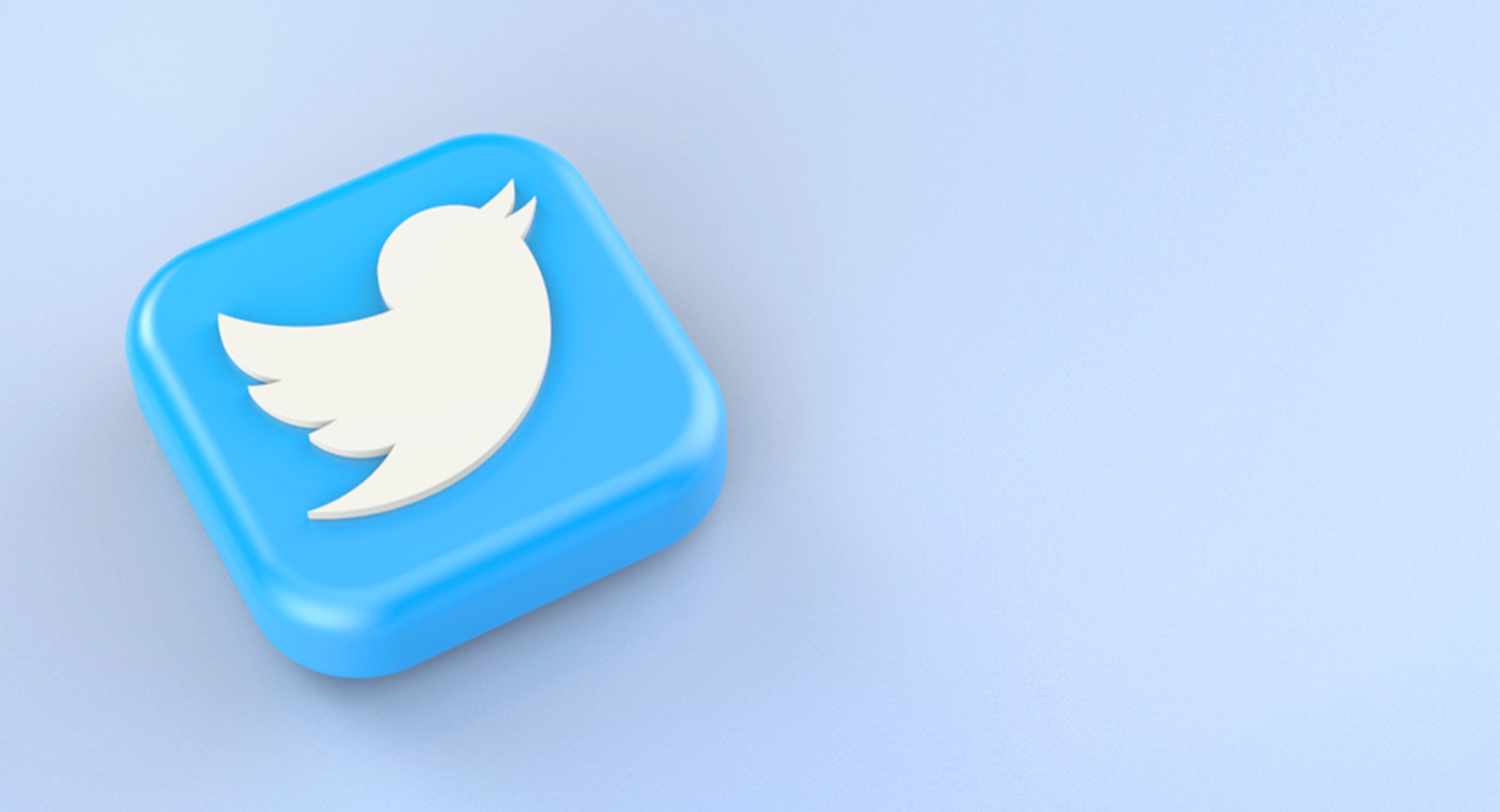 The Twitter logo appears on a 3D blue tile in this image for a blog about Twitter stats for marketers and brands.