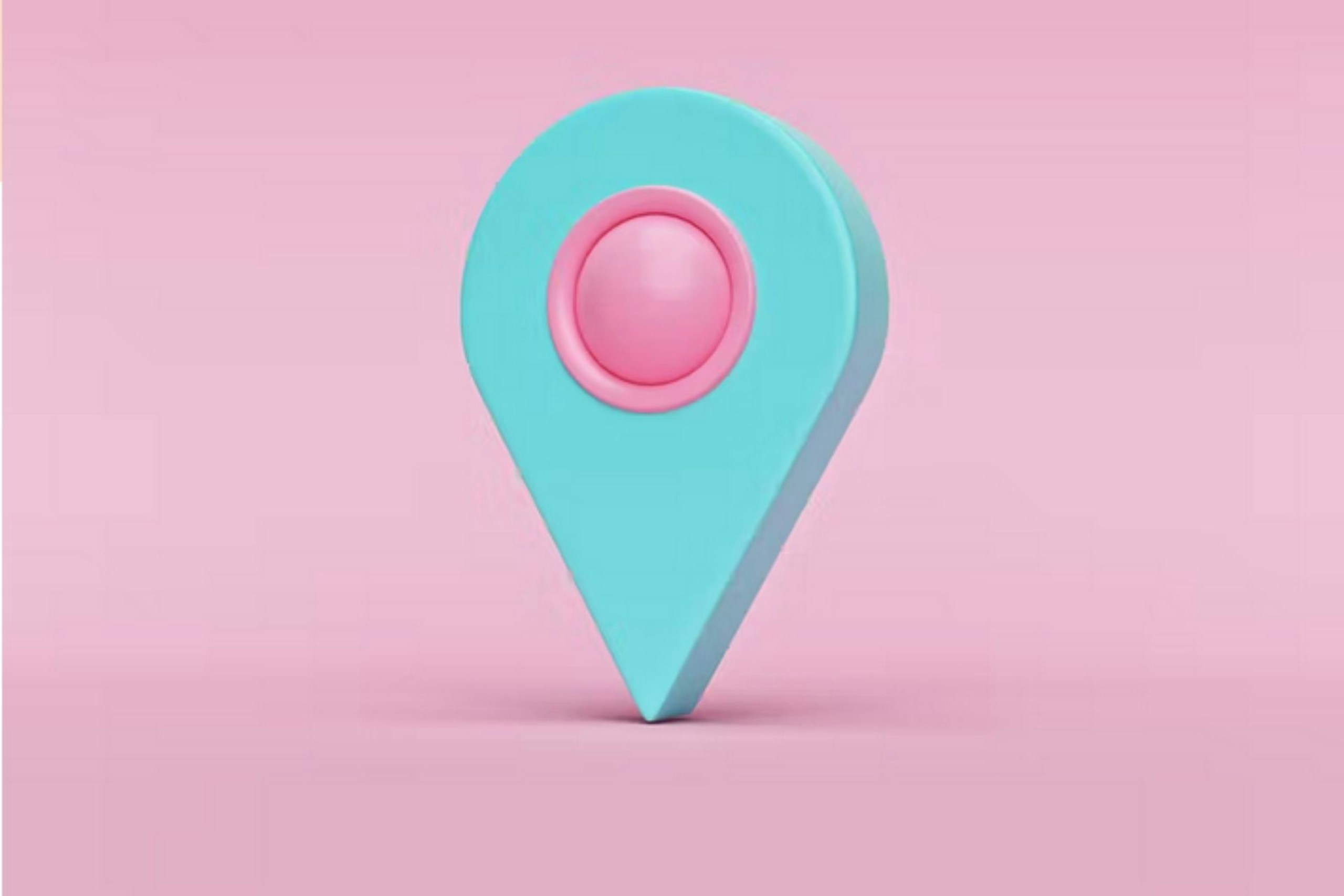 Epingle bleue de localisation sur fond rose