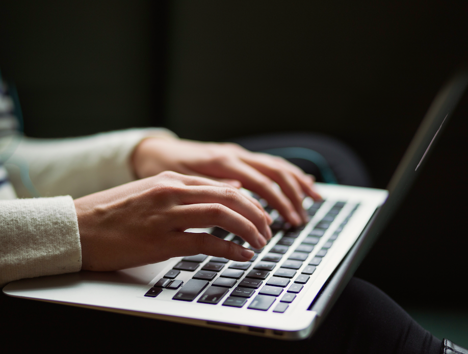 Photo of someone typing on their keyword