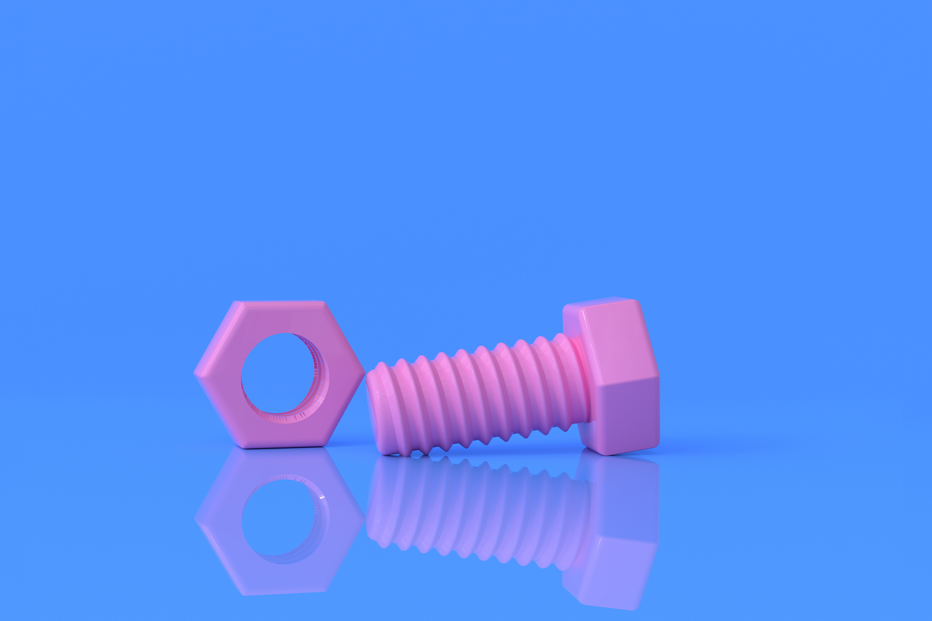 An image of a pink metal nut and bolt on a solid blue background. When building a branding guide, you'll need the right tools — and this blog explains the nuts and bolts of putting together an impactful strategy. 