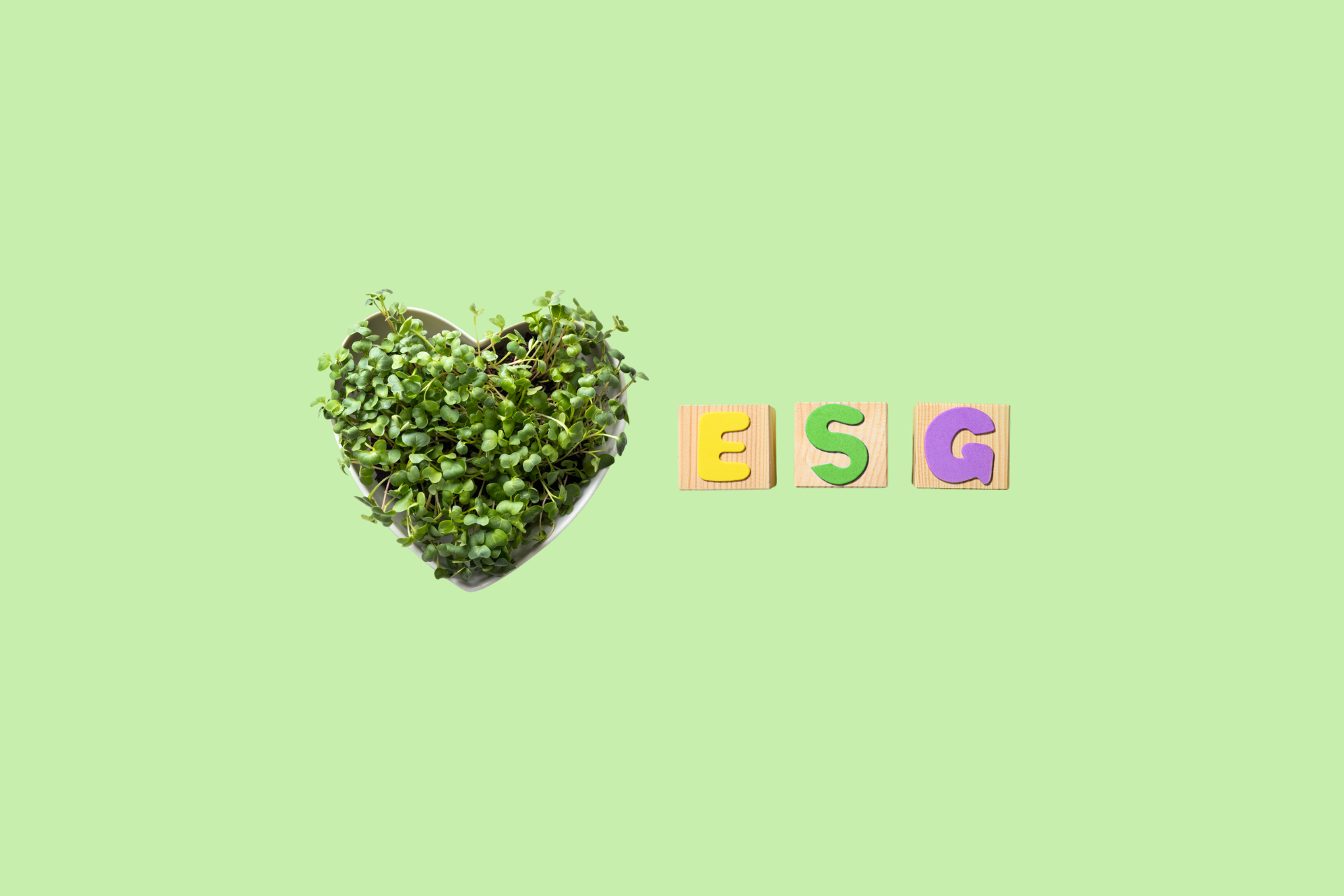 ESG banner with leaves in a heart shape
