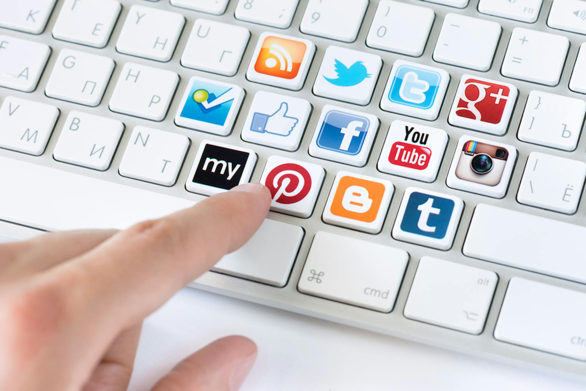 finger typing keyboard social media icons