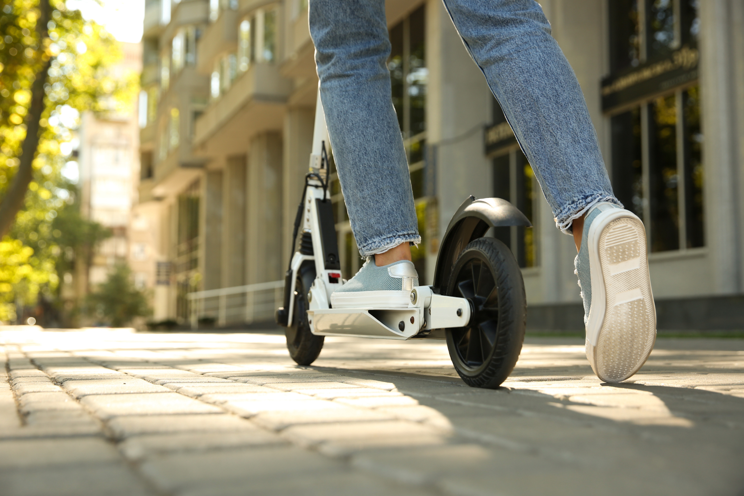 A person using an e-scooter