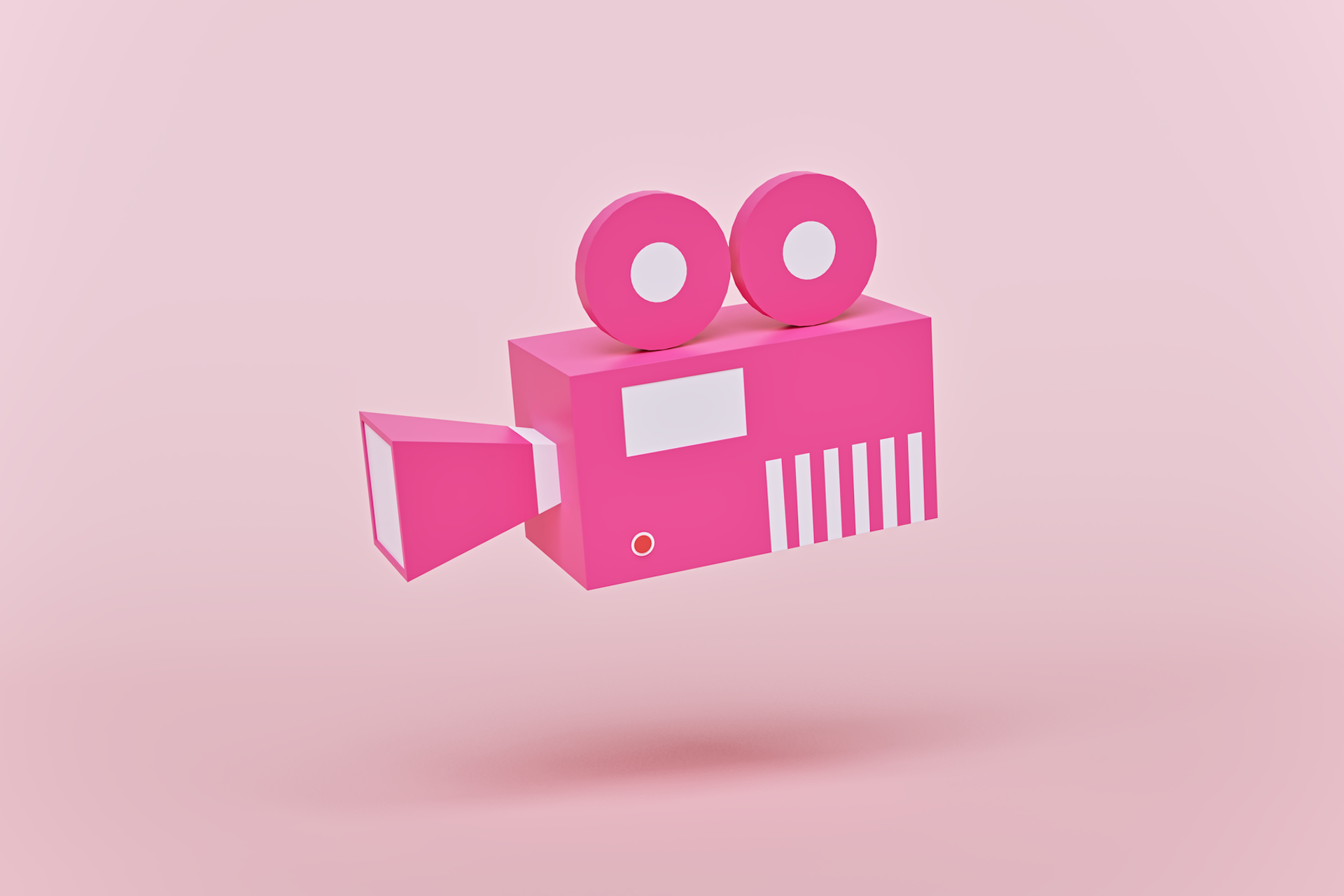 Pink old fashioned movie camera on light pink background. 50 video ideas for brands