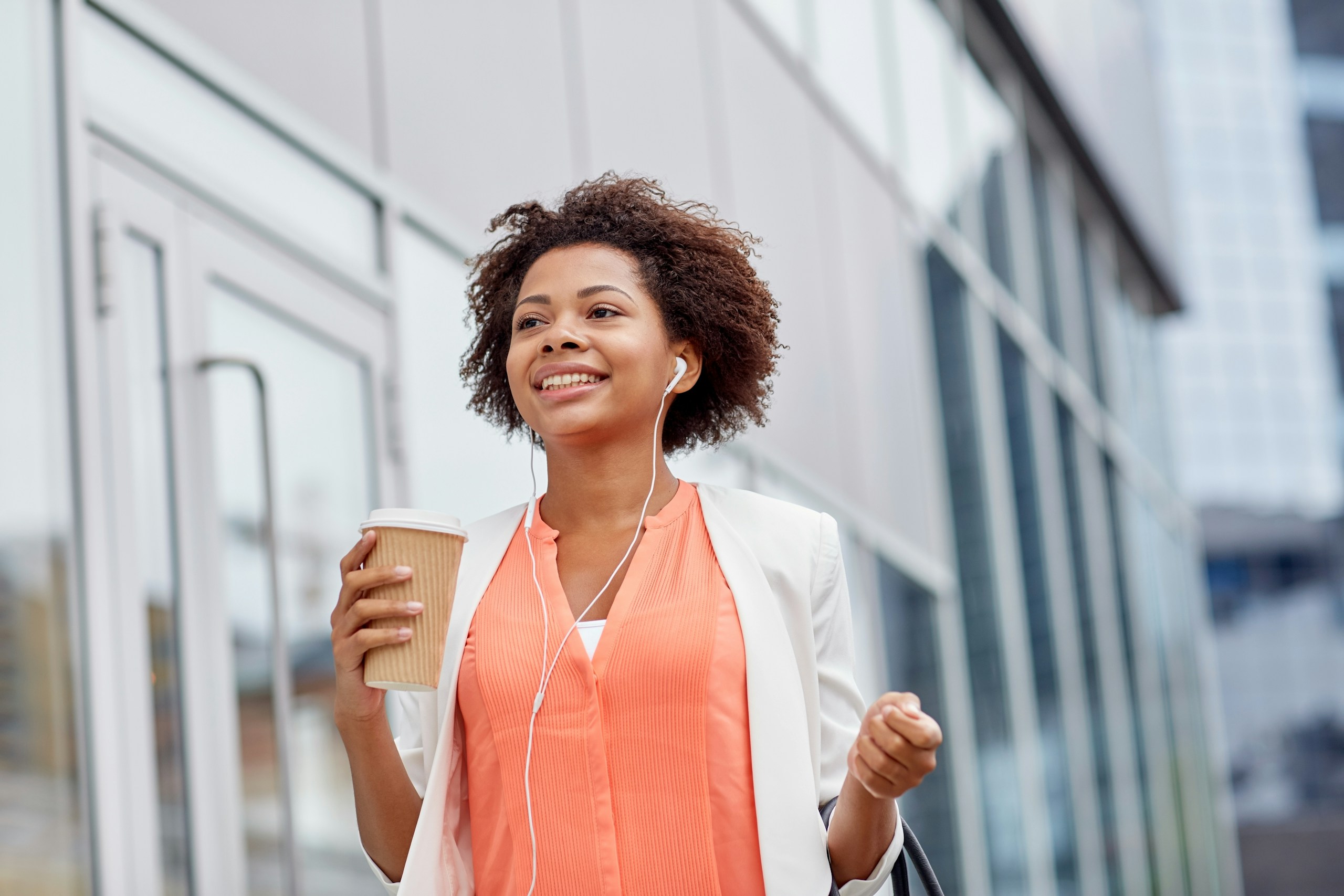 businesswoman listen to podcast
