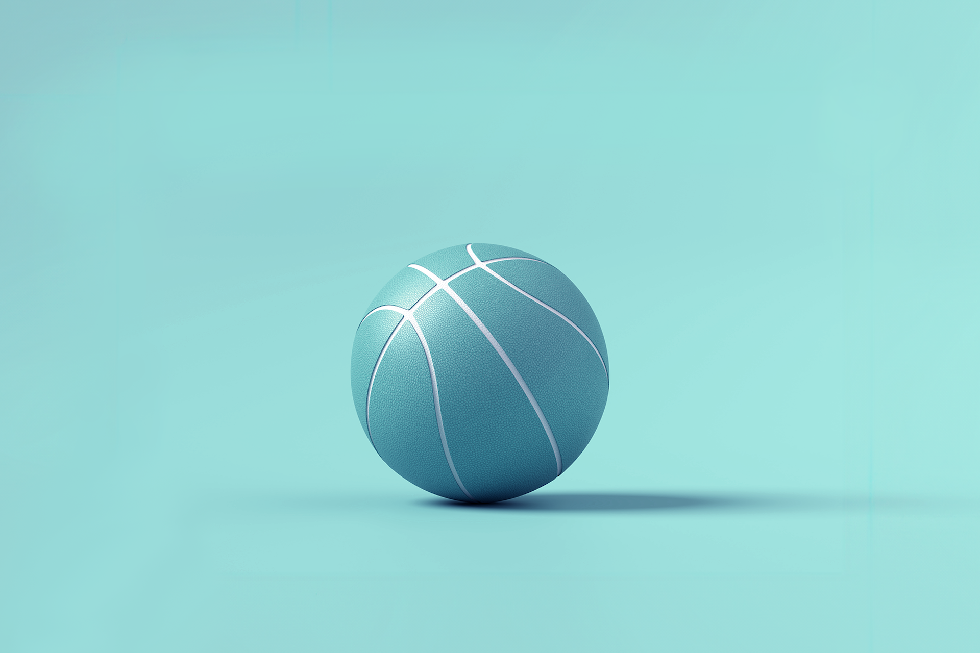 A blue basketball against a blue background in an image for a blog about Meltwater's social listening analysis of March Madness 2024.