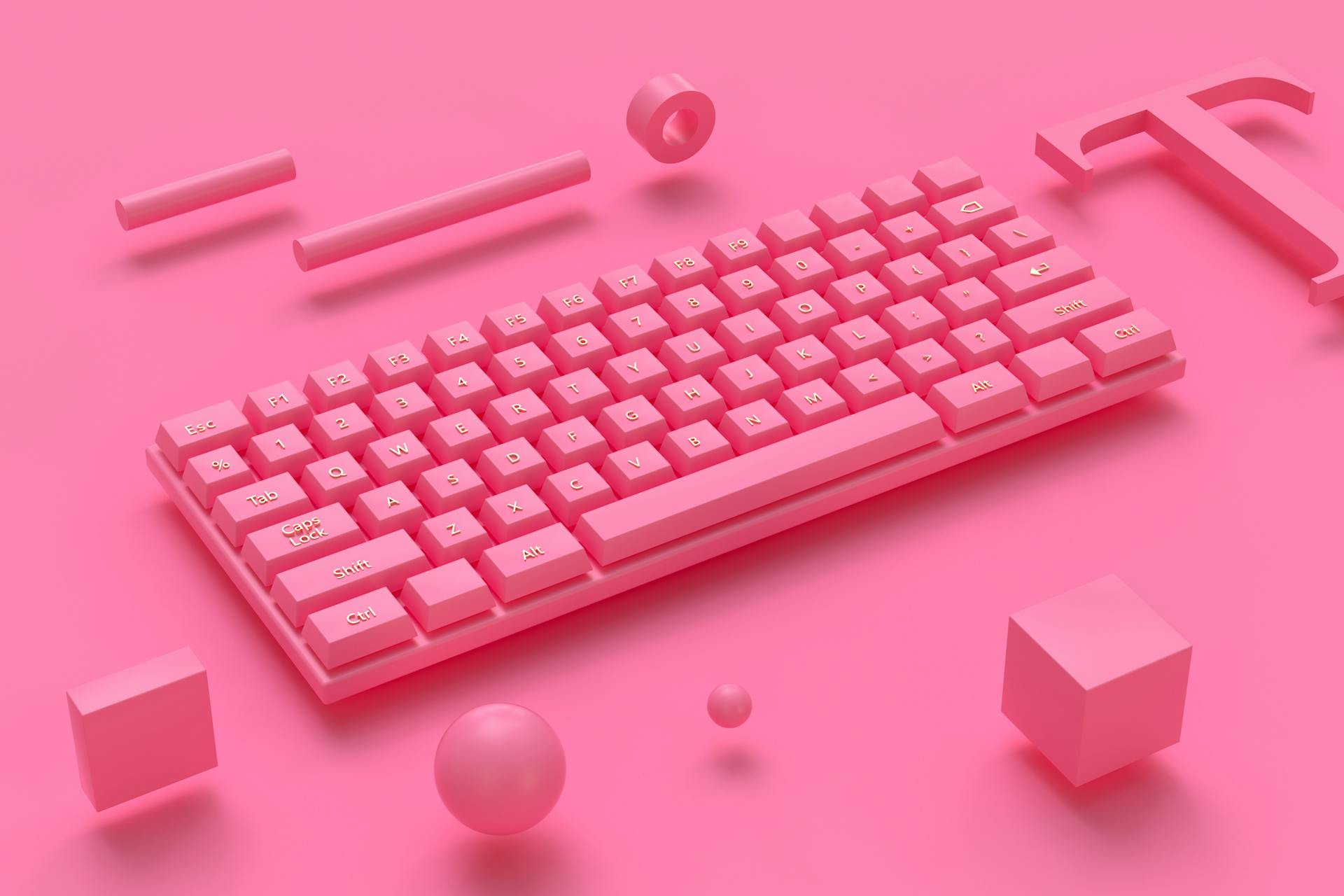 A pink laptop on a bright pink backdrop