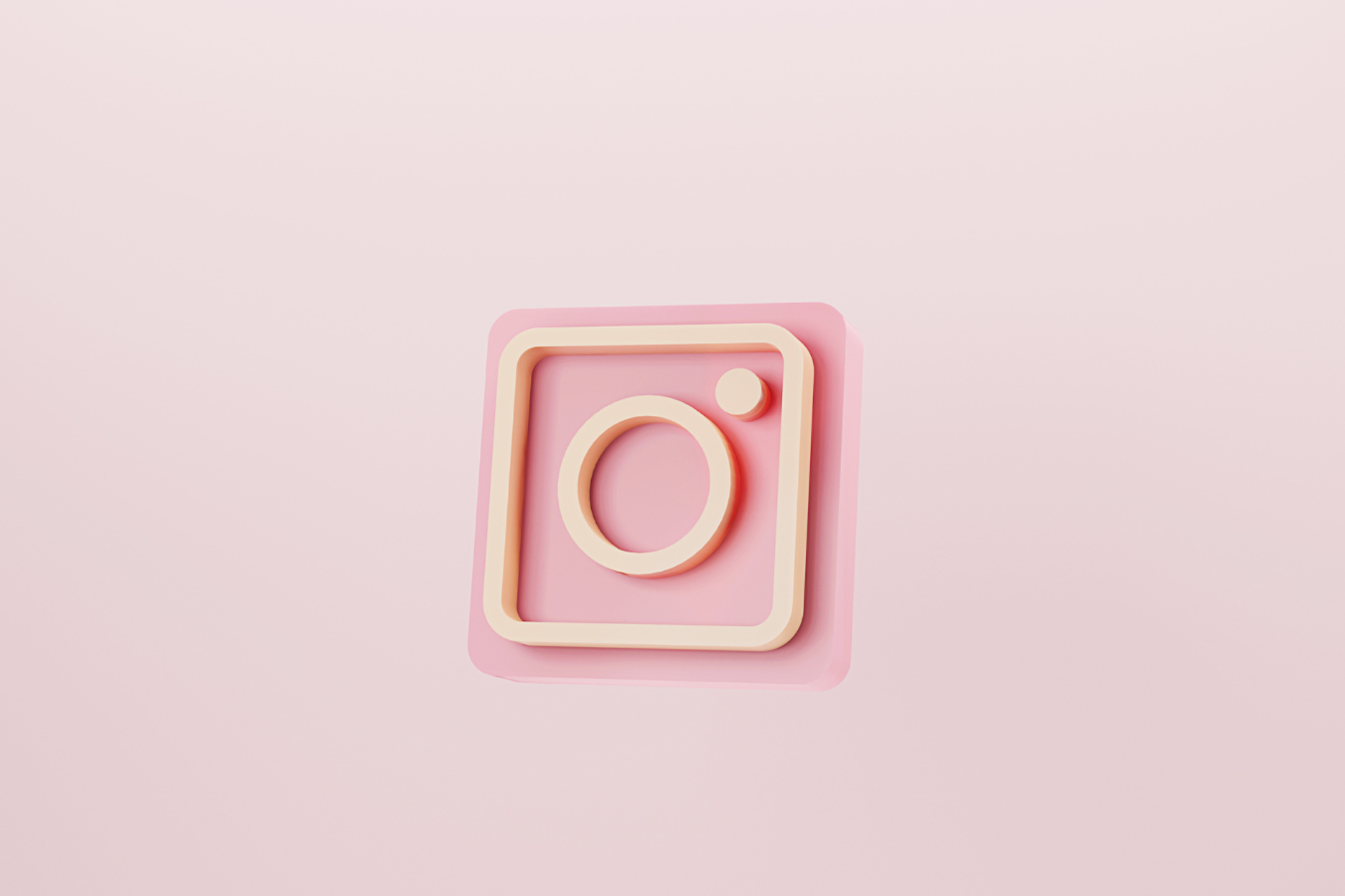 logo instagram sur fond rose 