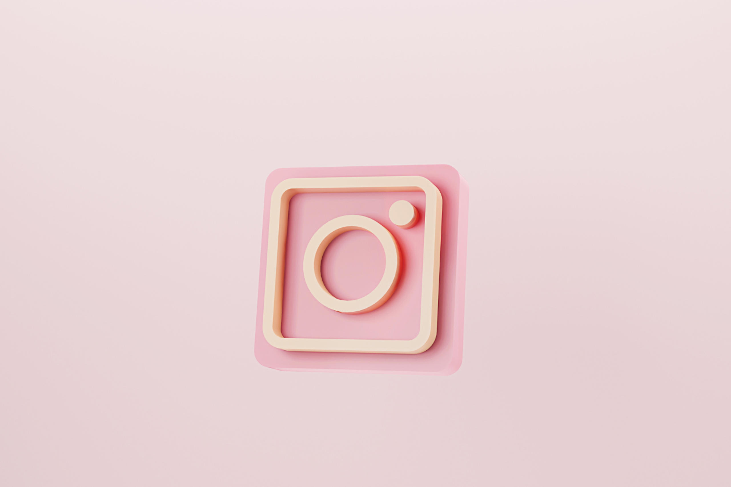 logo instagram sur fond rose
