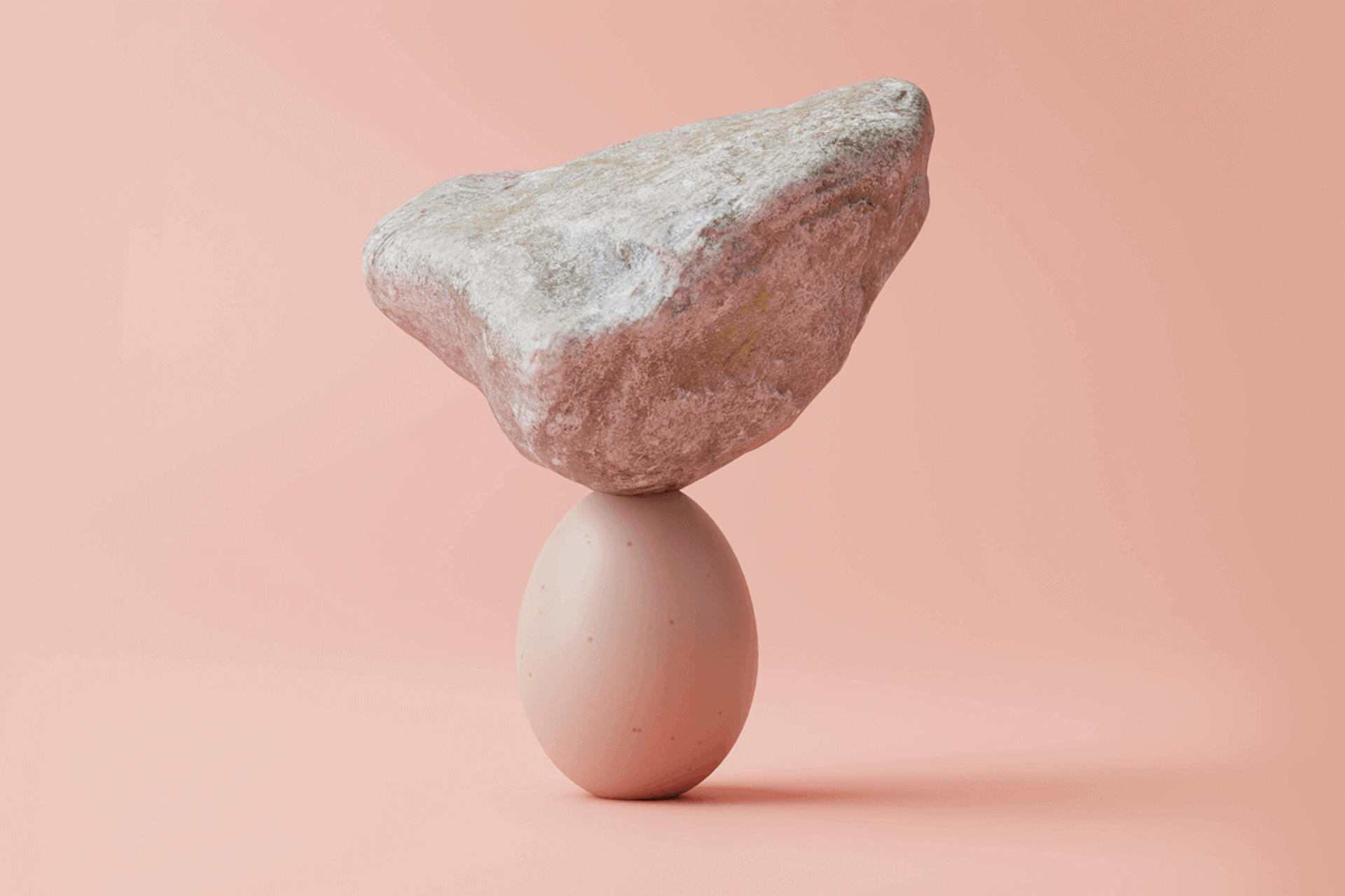 A rock balanced on top of an egg for a Meltwater blog about building resilience to misinformation and disinformation.