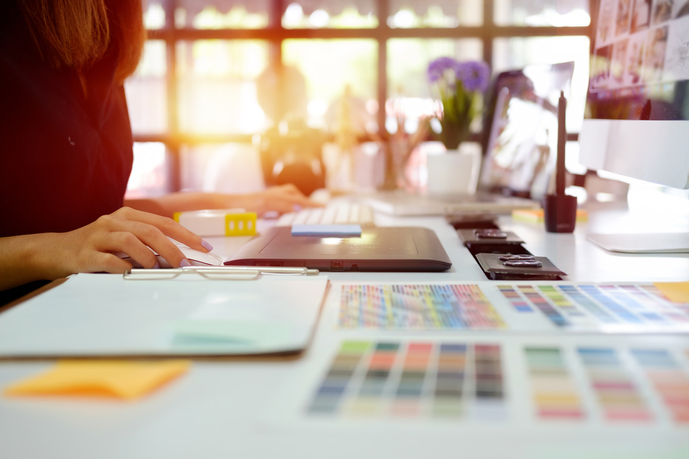 Photo of a woman working at her desk