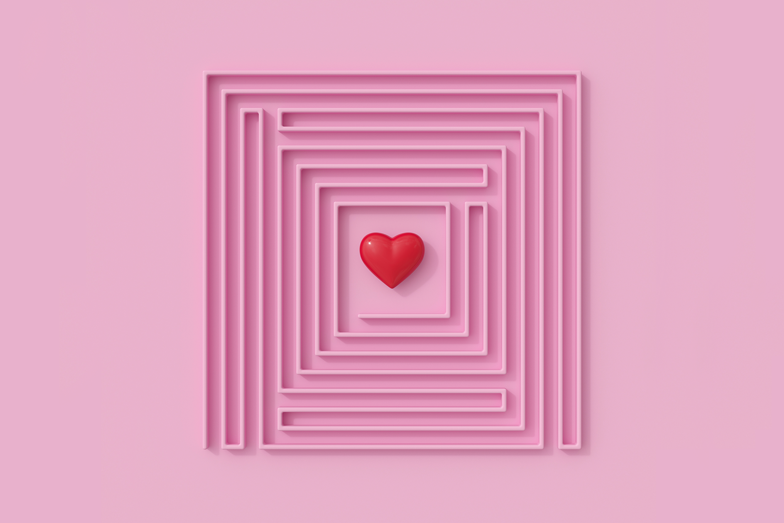 Kundentreue ist schwer zu erreichen, und dieses Bild eines Labyrinths von oben mit einem Herz in der Mitte repräsentiert perfekt die unermüdliche Reise, die Vermarkter unternehmen müssen, um Kundentreue zu erreichen.