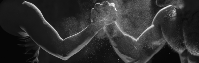 Two people clasping hands