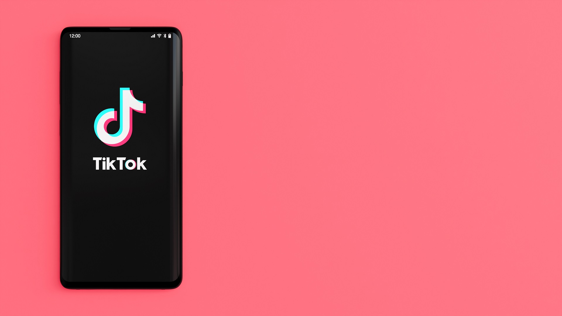 TikTok logo in phone with pink background
