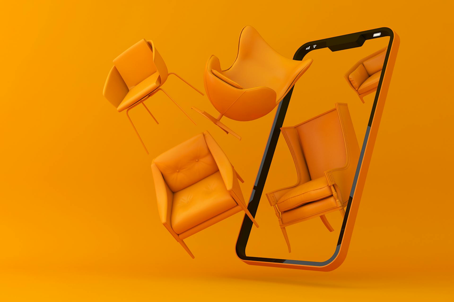 Kuva älypuhelimesta, jossa erityyppiset huonekalut tulevat todelliseen tilaan puhelimen ulkopuolella. Lisätyn todellisuuden lopullinen opas